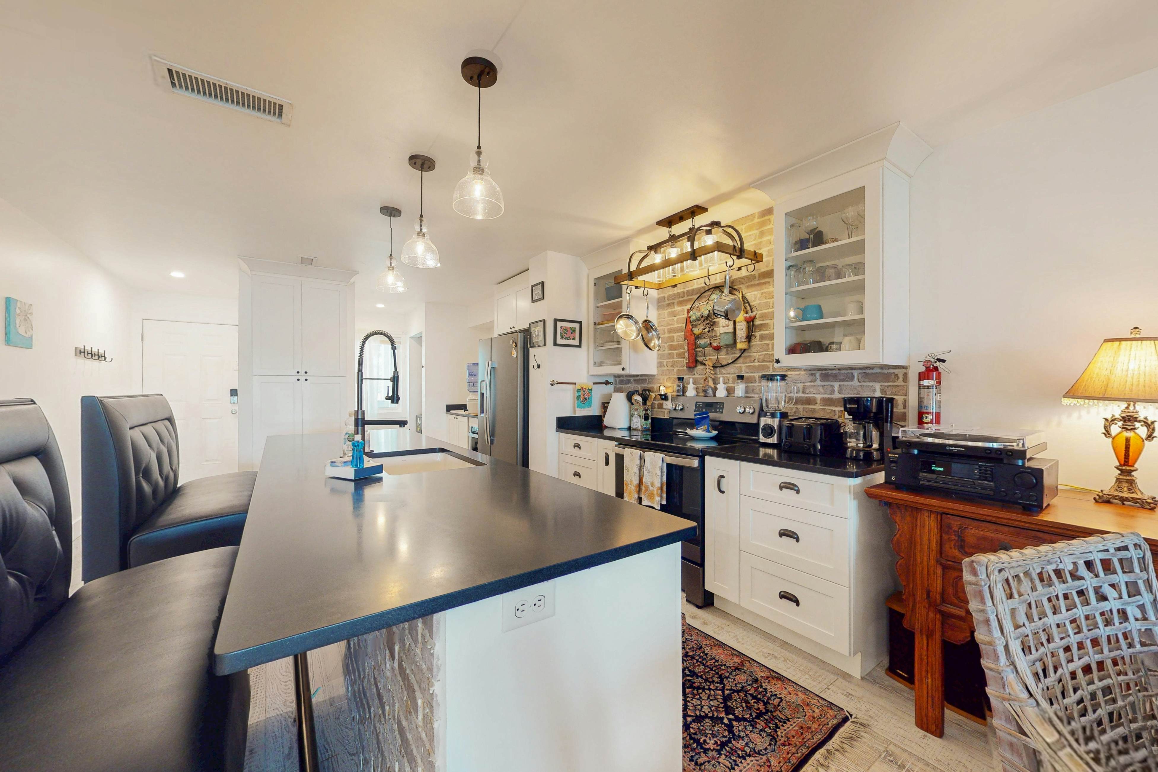 1st-floor riverfront condo w/spectacular river views, balcony, and central AC