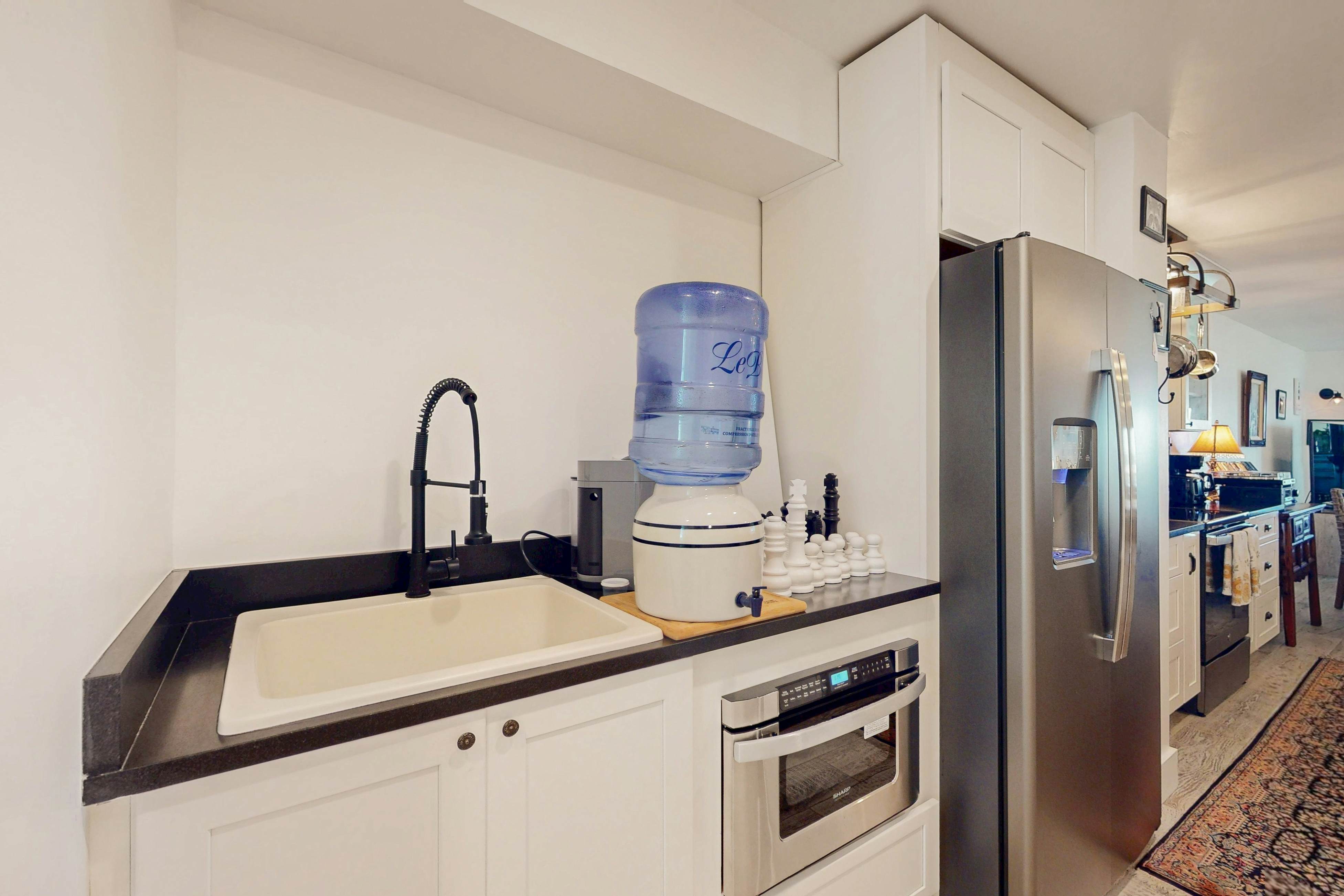 1st-floor riverfront condo w/spectacular river views, balcony, and central AC