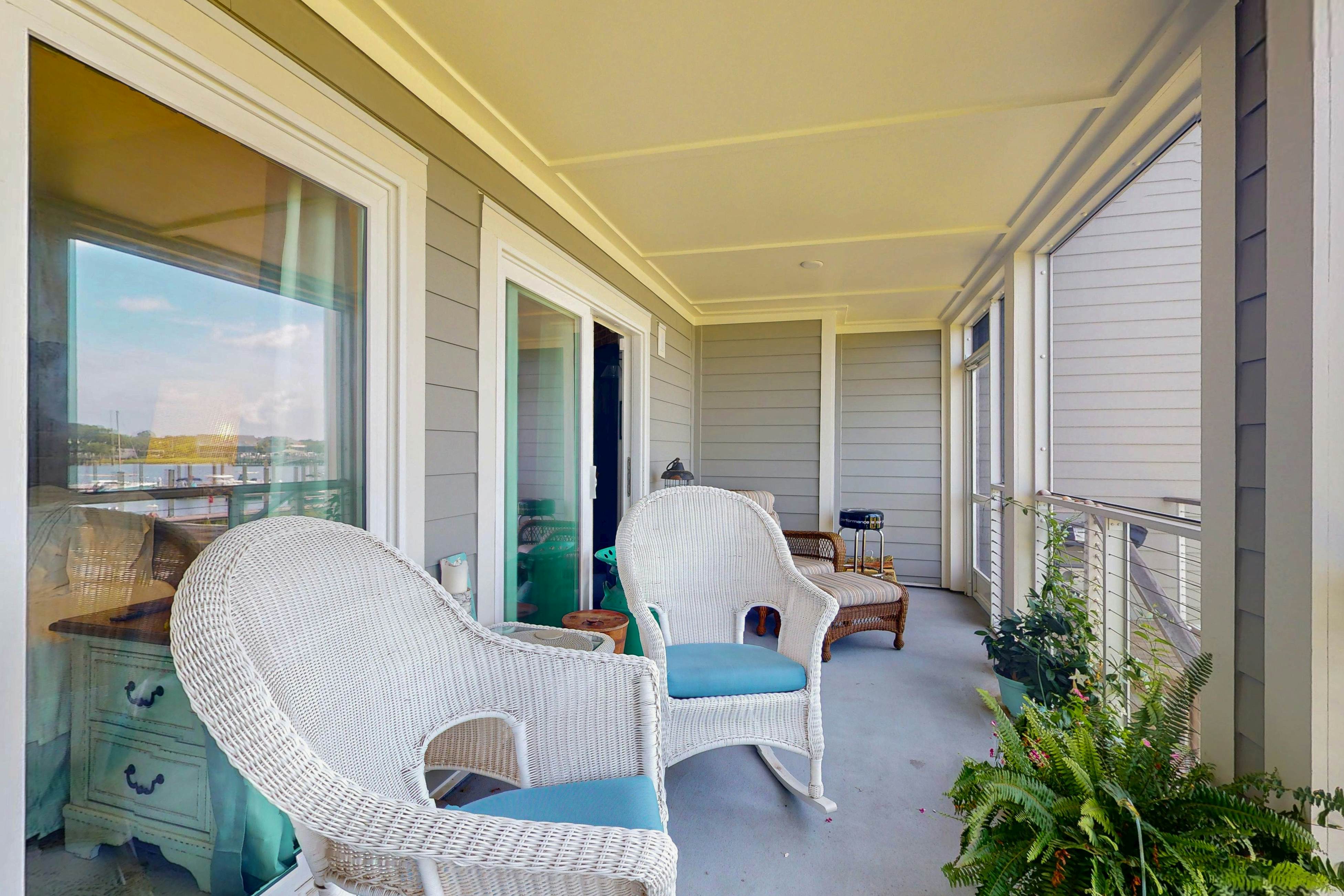 1st-floor riverfront condo w/spectacular river views, balcony, and central AC