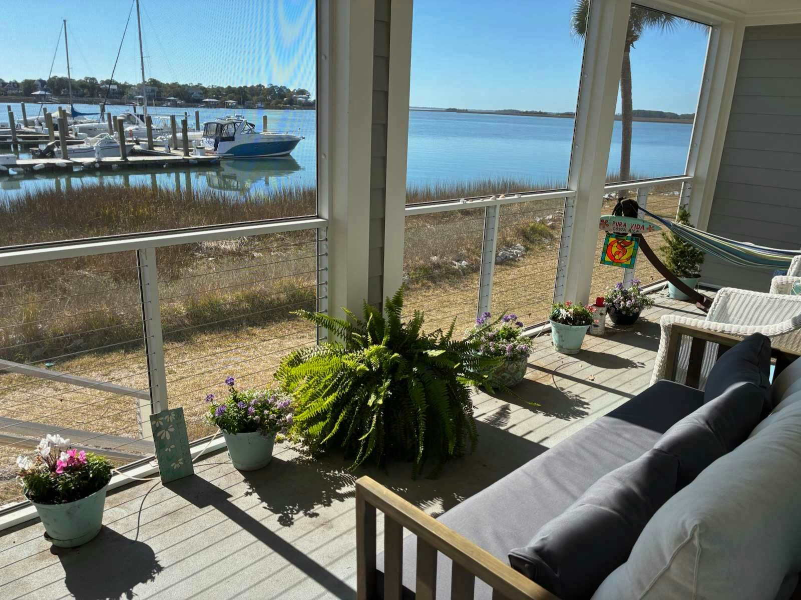 1st-floor riverfront condo w/spectacular river views, balcony, and central AC