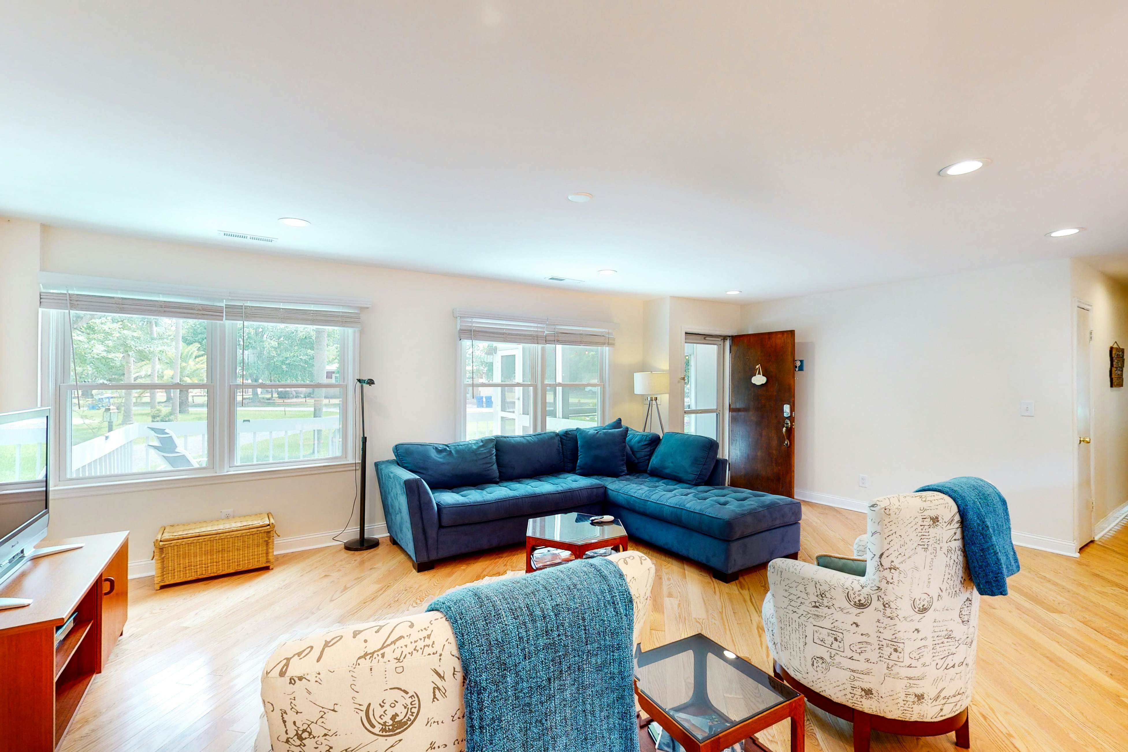 Comfortable dog-friendly home next door to rec center - blocks from beach access