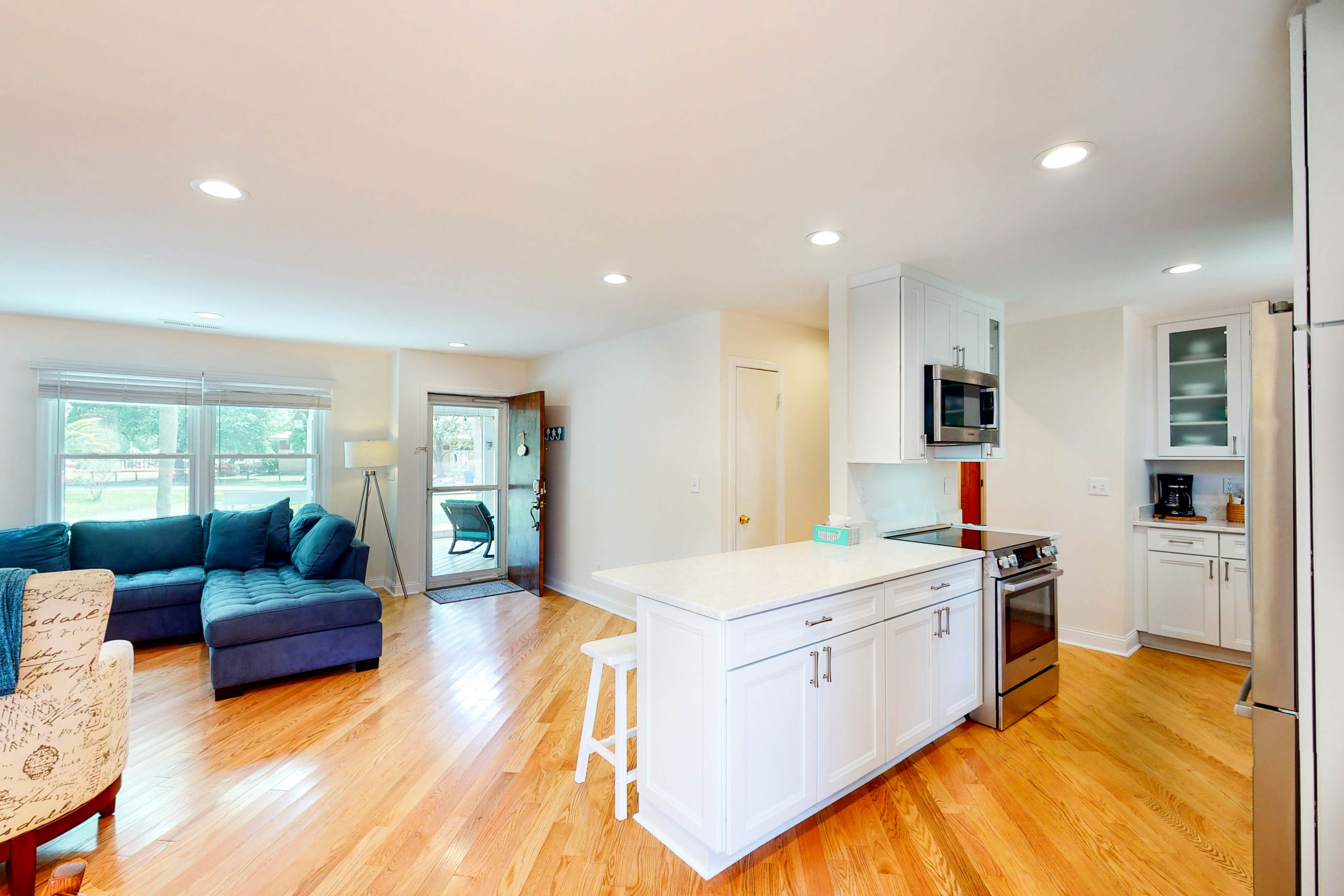 Comfortable dog-friendly home next door to rec center - blocks from beach access
