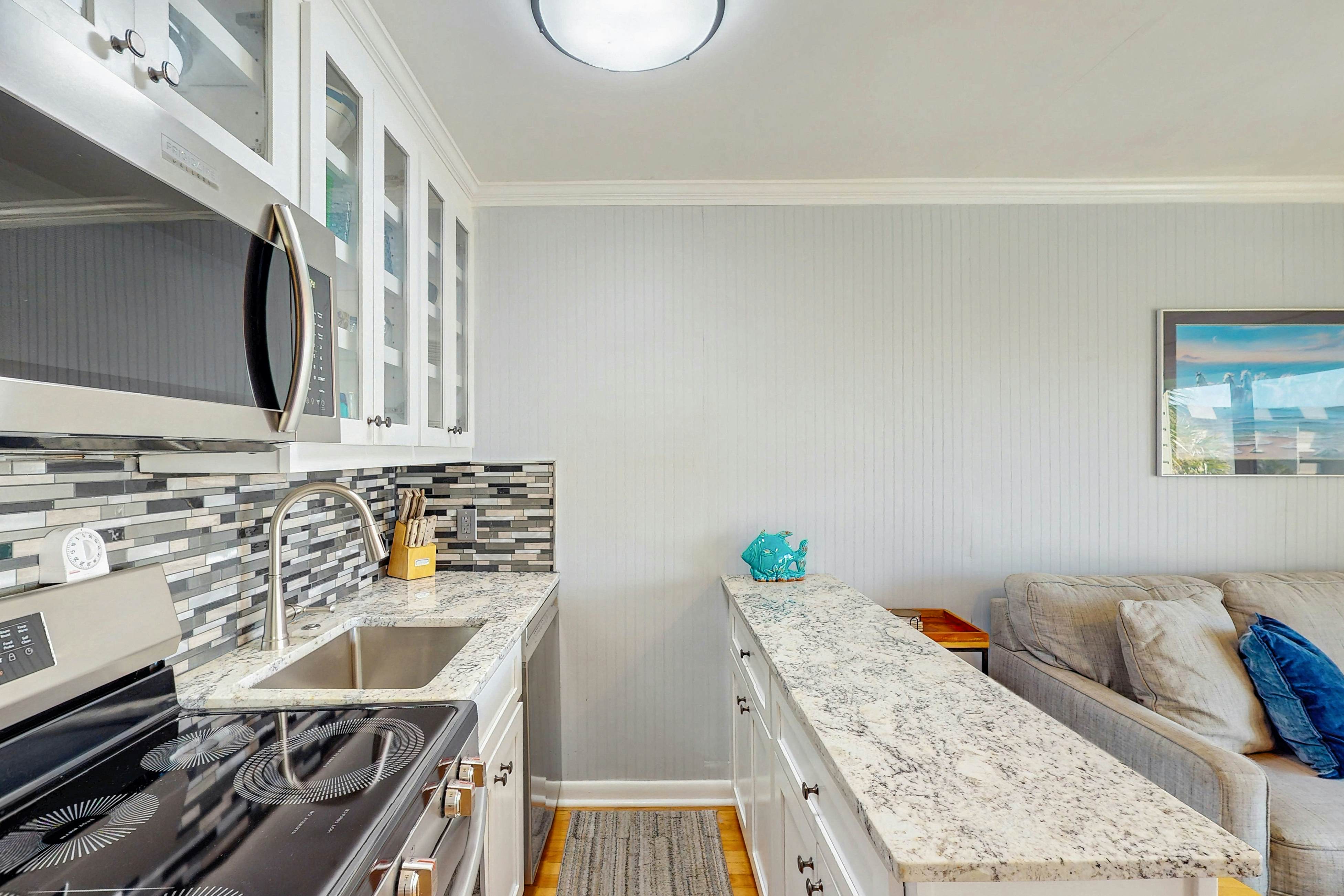 Renovated villa with gorgeous ocean views, pool, grills, & great location