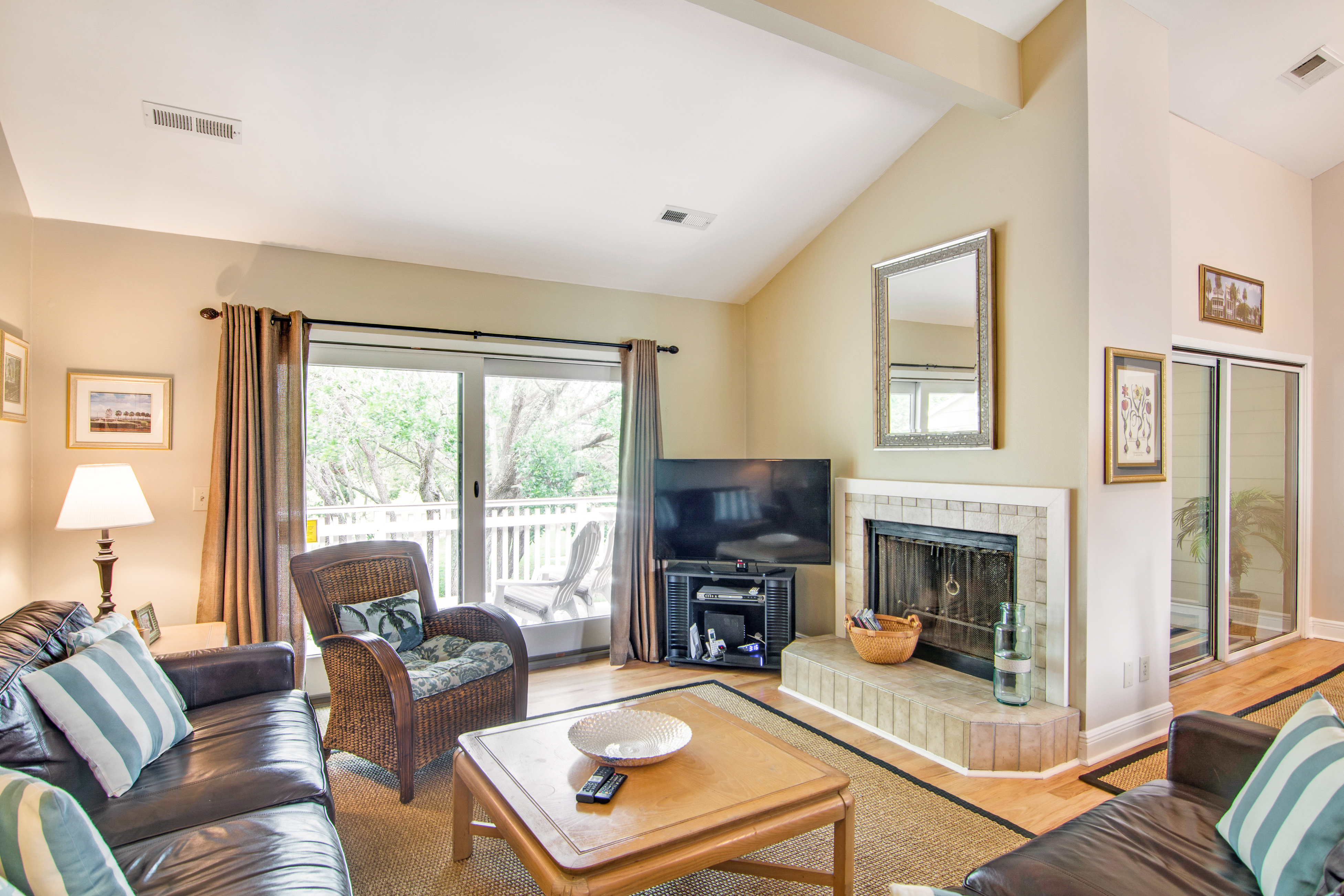 Renovated townhome next to golf course w/ community pool access- close to beach