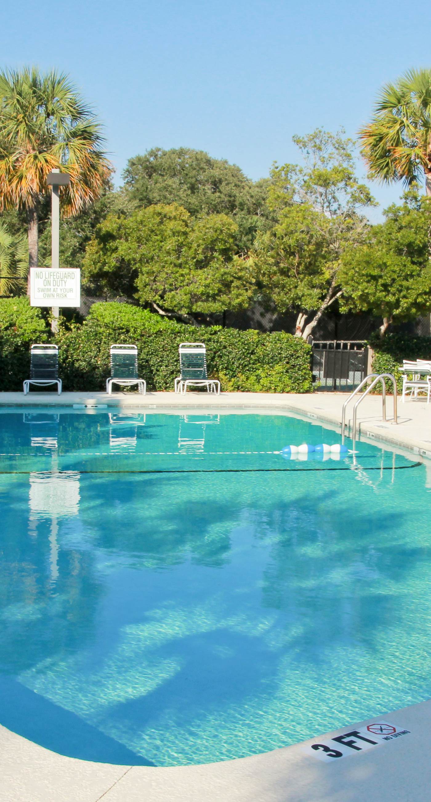 Renovated townhome next to golf course w/ community pool access- close to beach