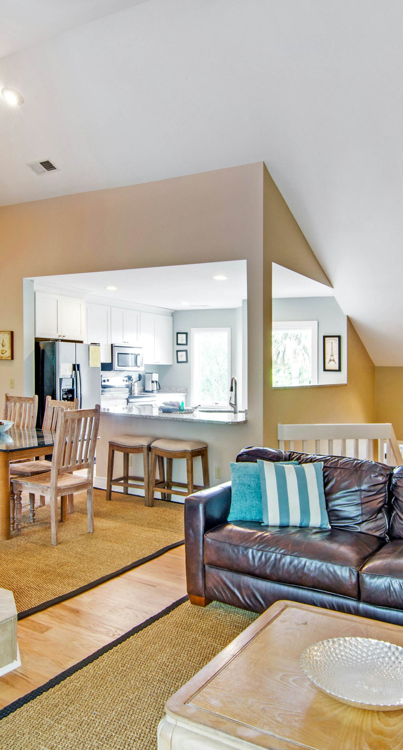 Renovated townhome next to golf course w/ community pool access- close to beach