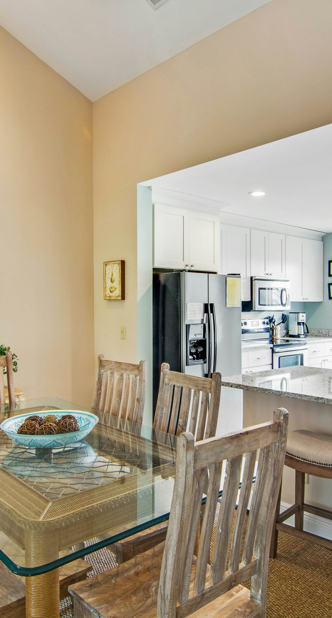 Renovated townhome next to golf course w/ community pool access- close to beach