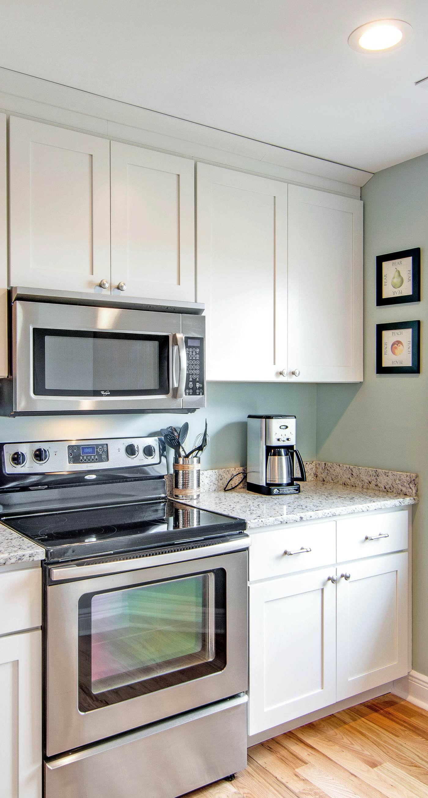 Renovated townhome next to golf course w/ community pool access- close to beach