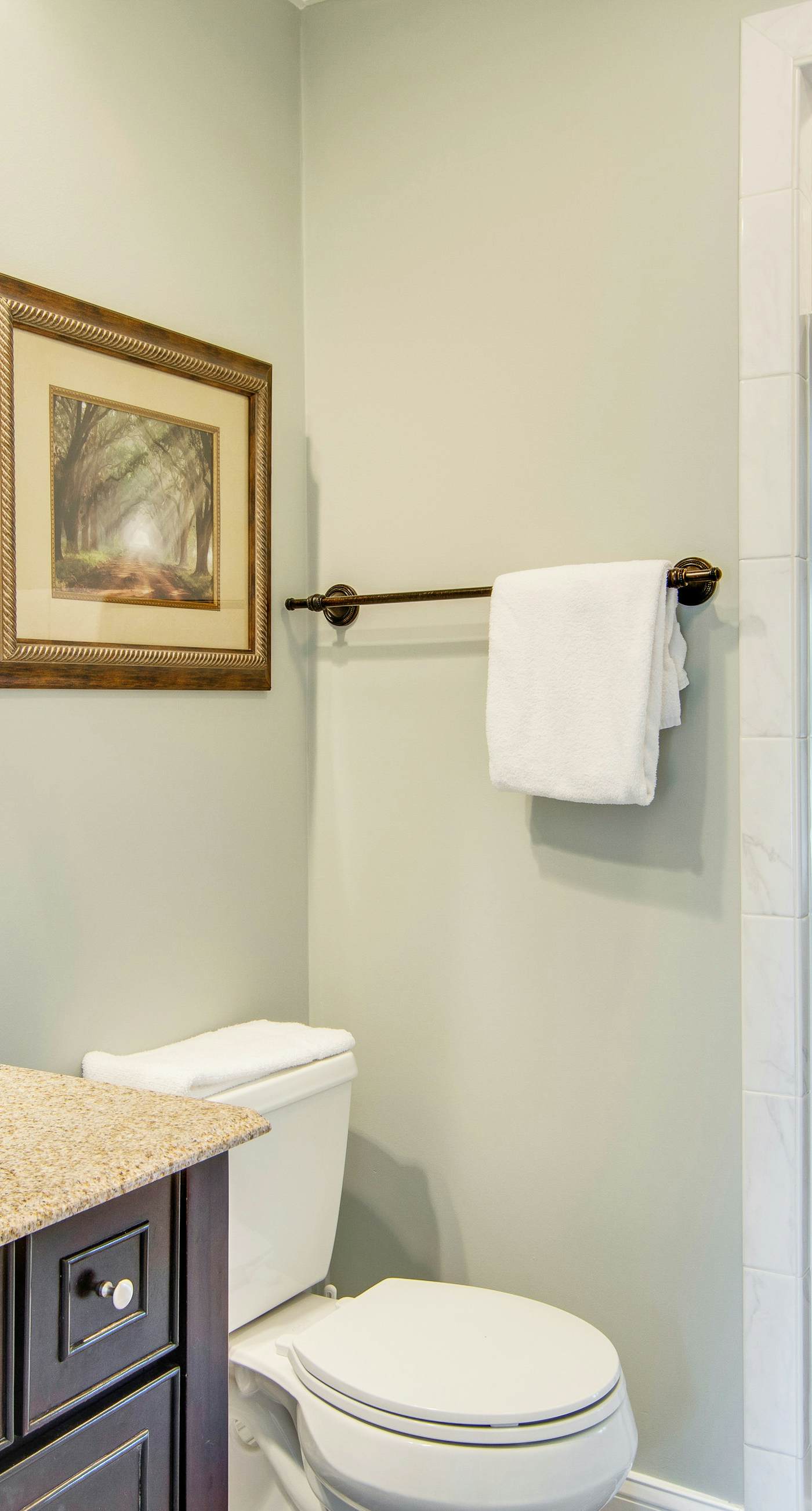 Renovated townhome next to golf course w/ community pool access- close to beach