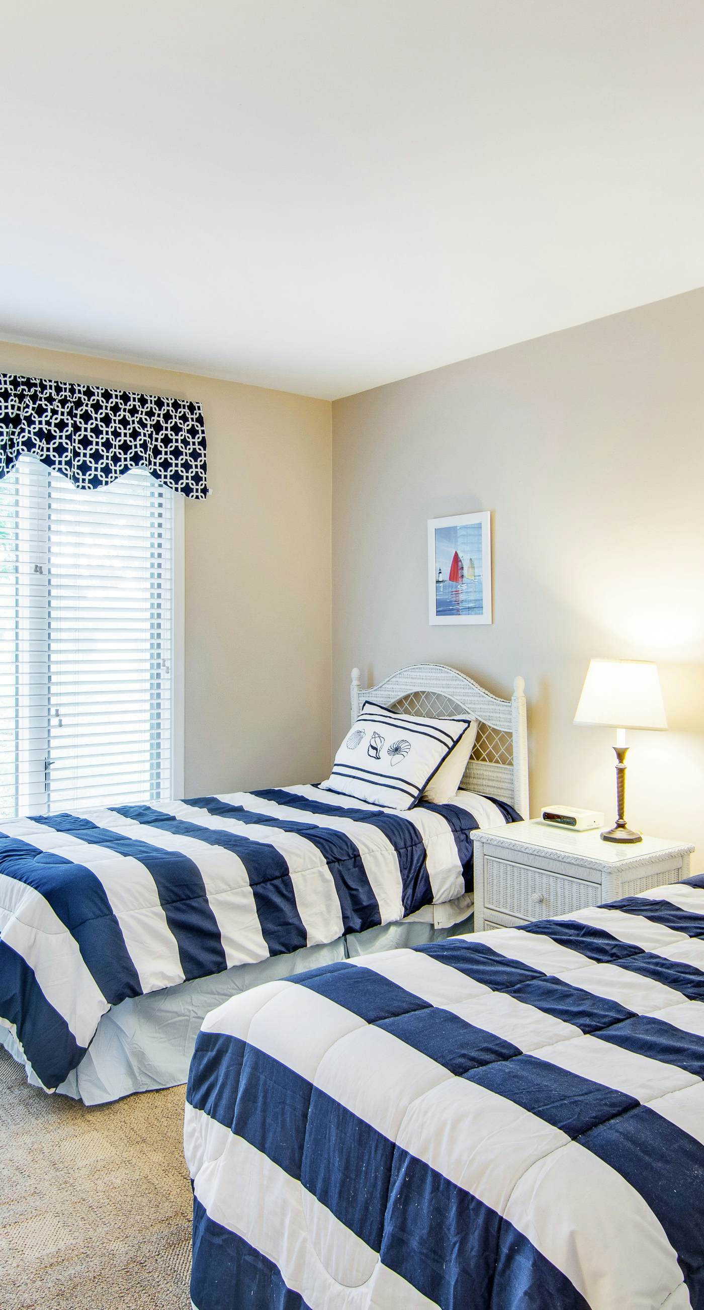 Renovated townhome next to golf course w/ community pool access- close to beach