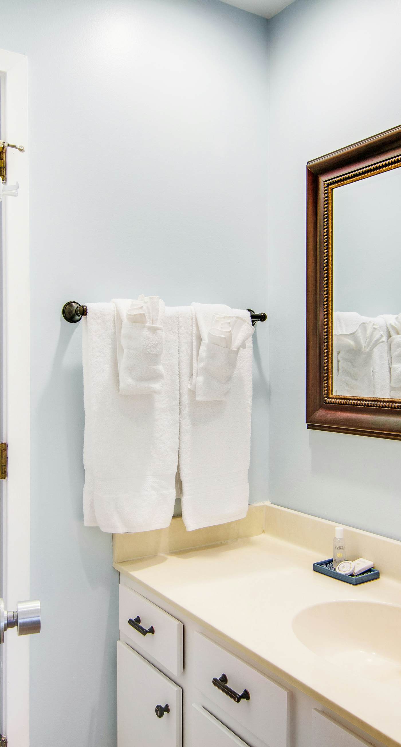 Renovated townhome next to golf course w/ community pool access- close to beach