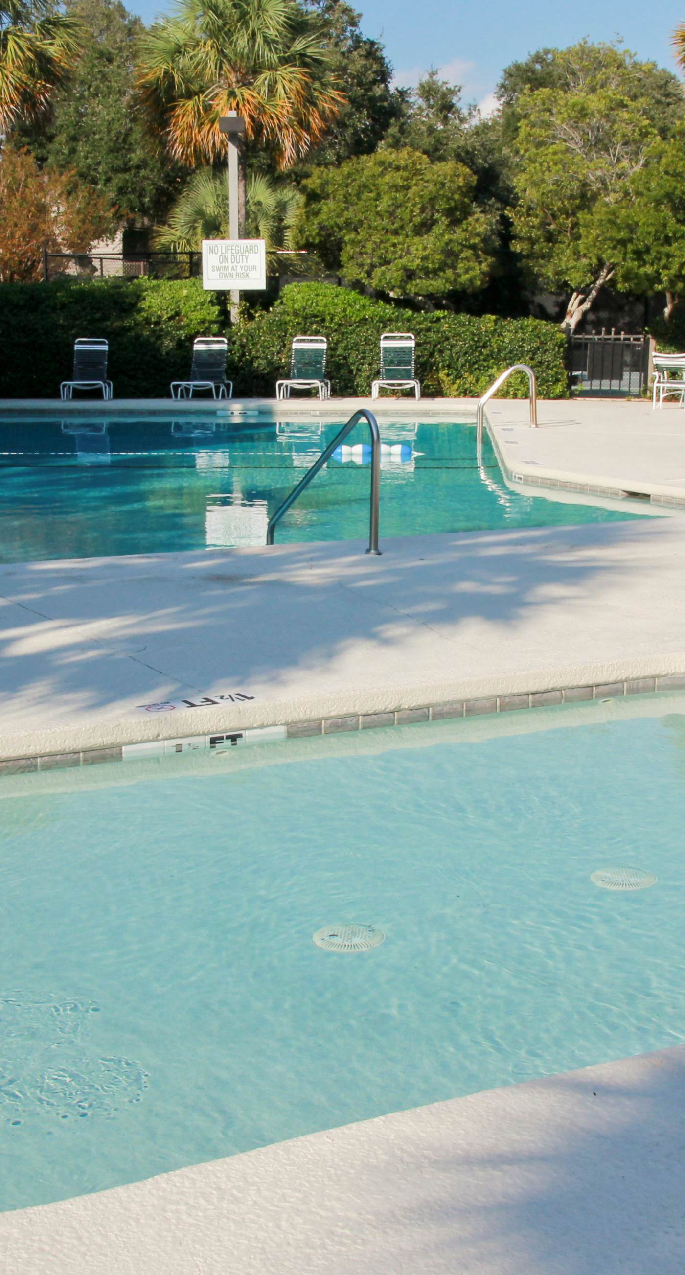 Renovated townhome next to golf course w/ community pool access- close to beach