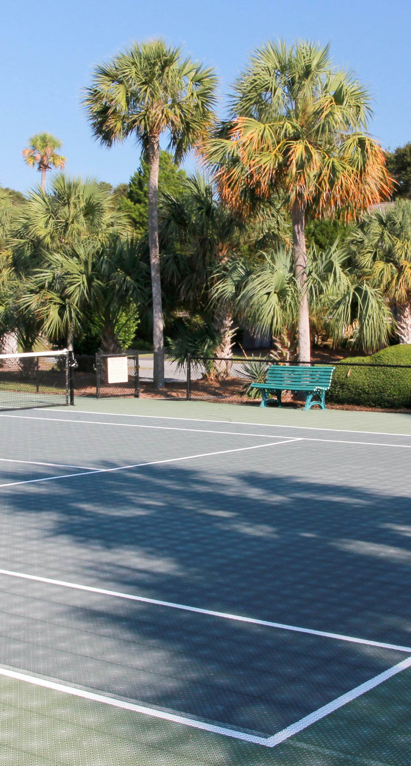 Renovated townhome next to golf course w/ community pool access- close to beach