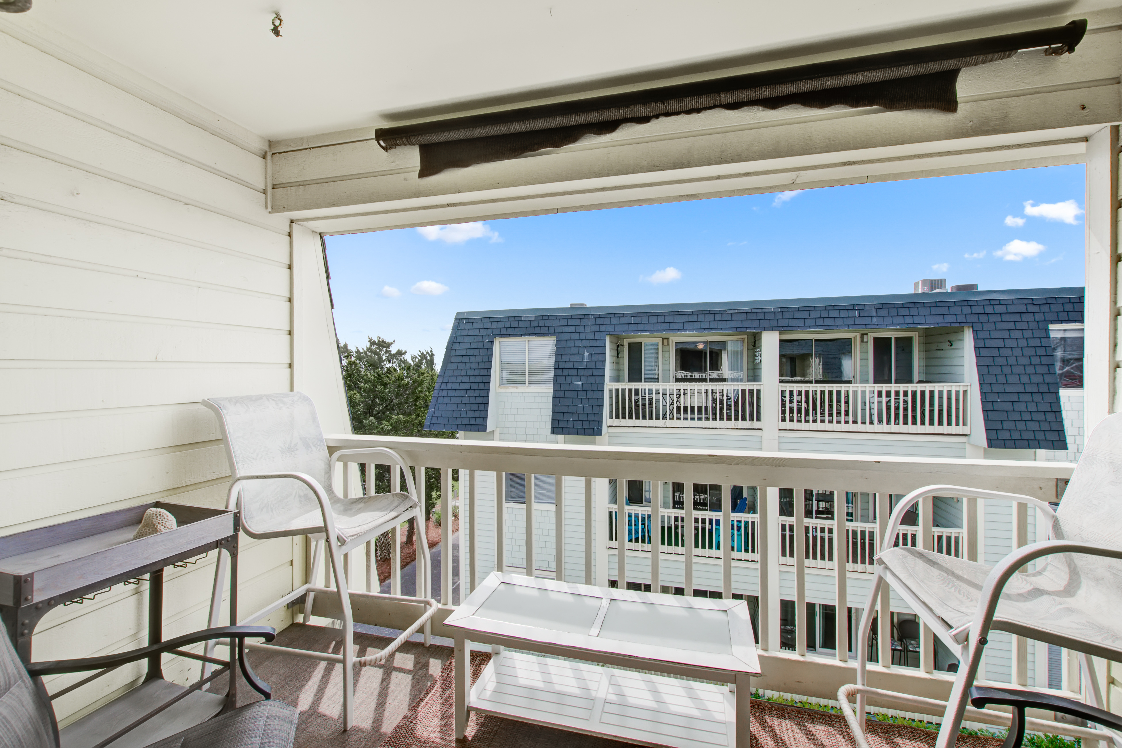 Comfortable villa one row away from the beach w/shared pool & grills