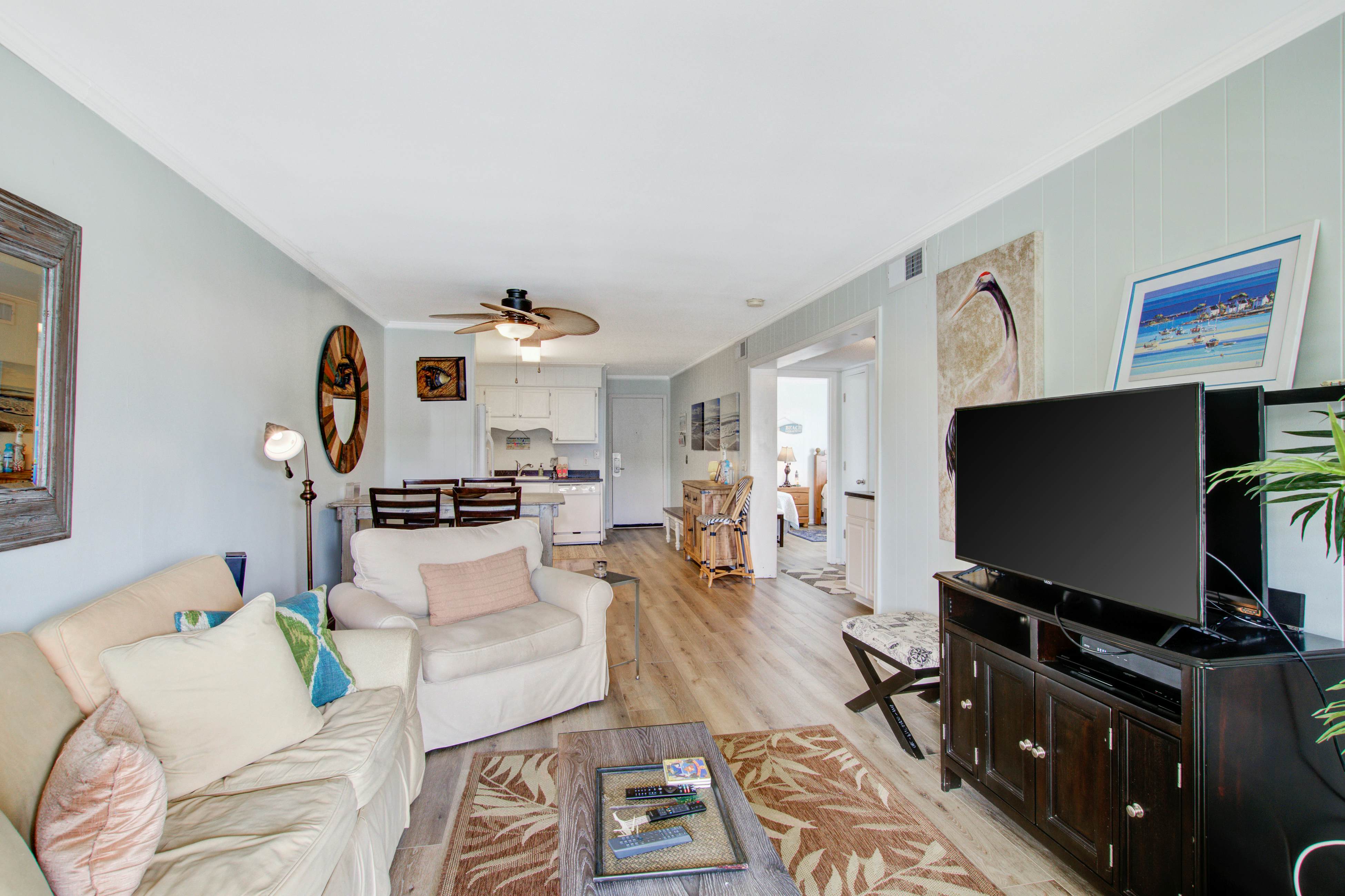 Comfortable villa one row away from the beach w/shared pool & grills