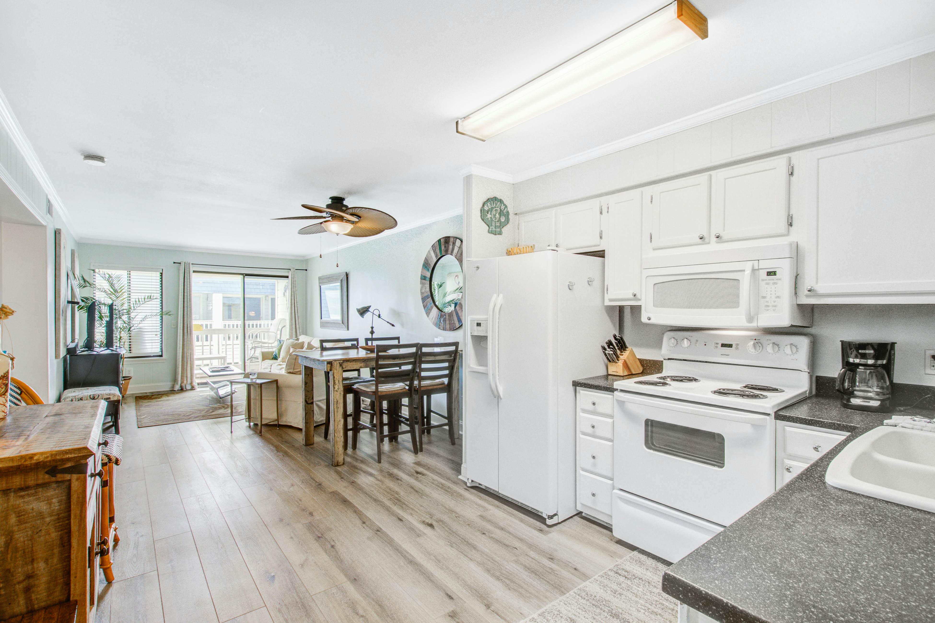 Comfortable villa one row away from the beach w/shared pool & grills