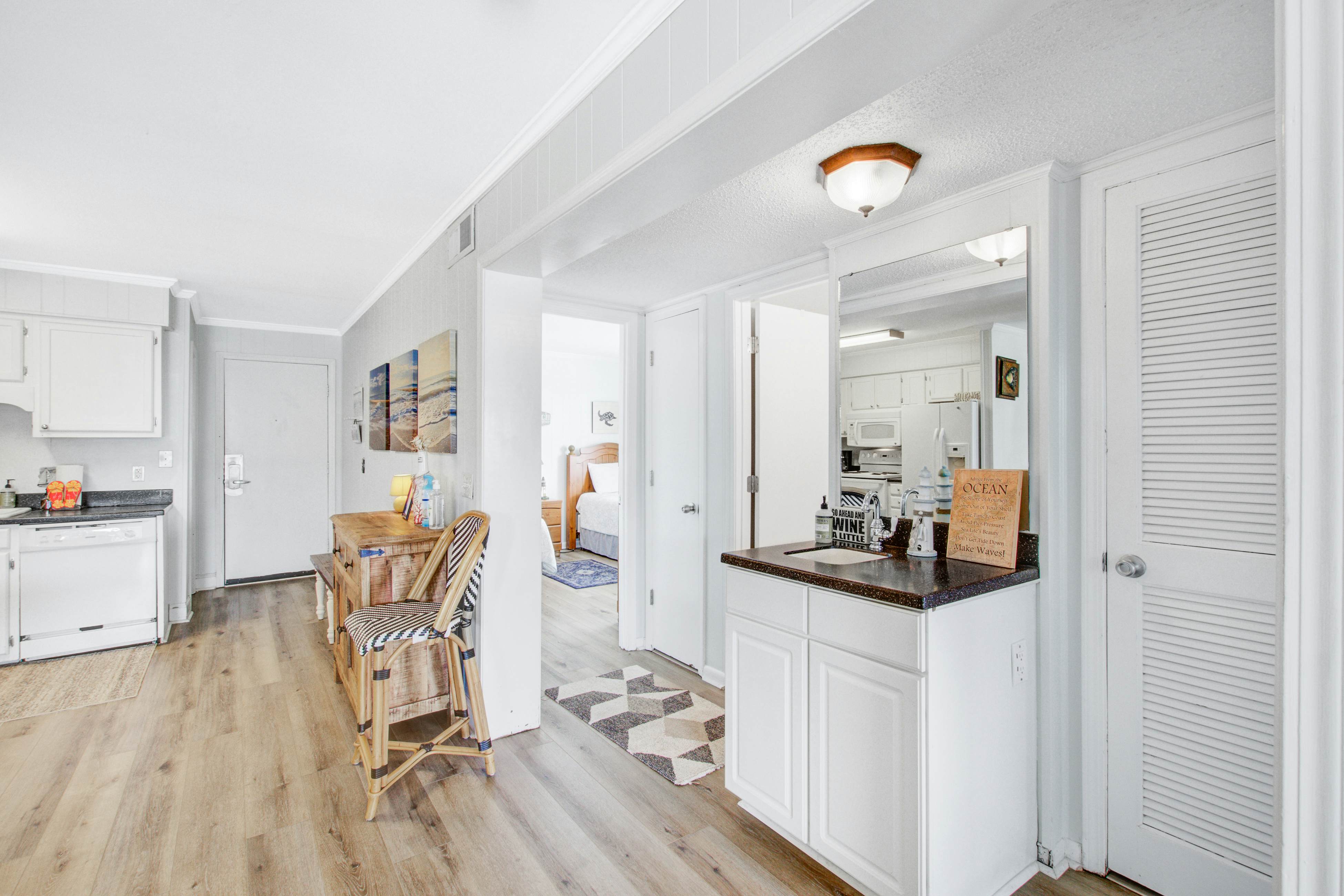 Comfortable villa one row away from the beach w/shared pool & grills