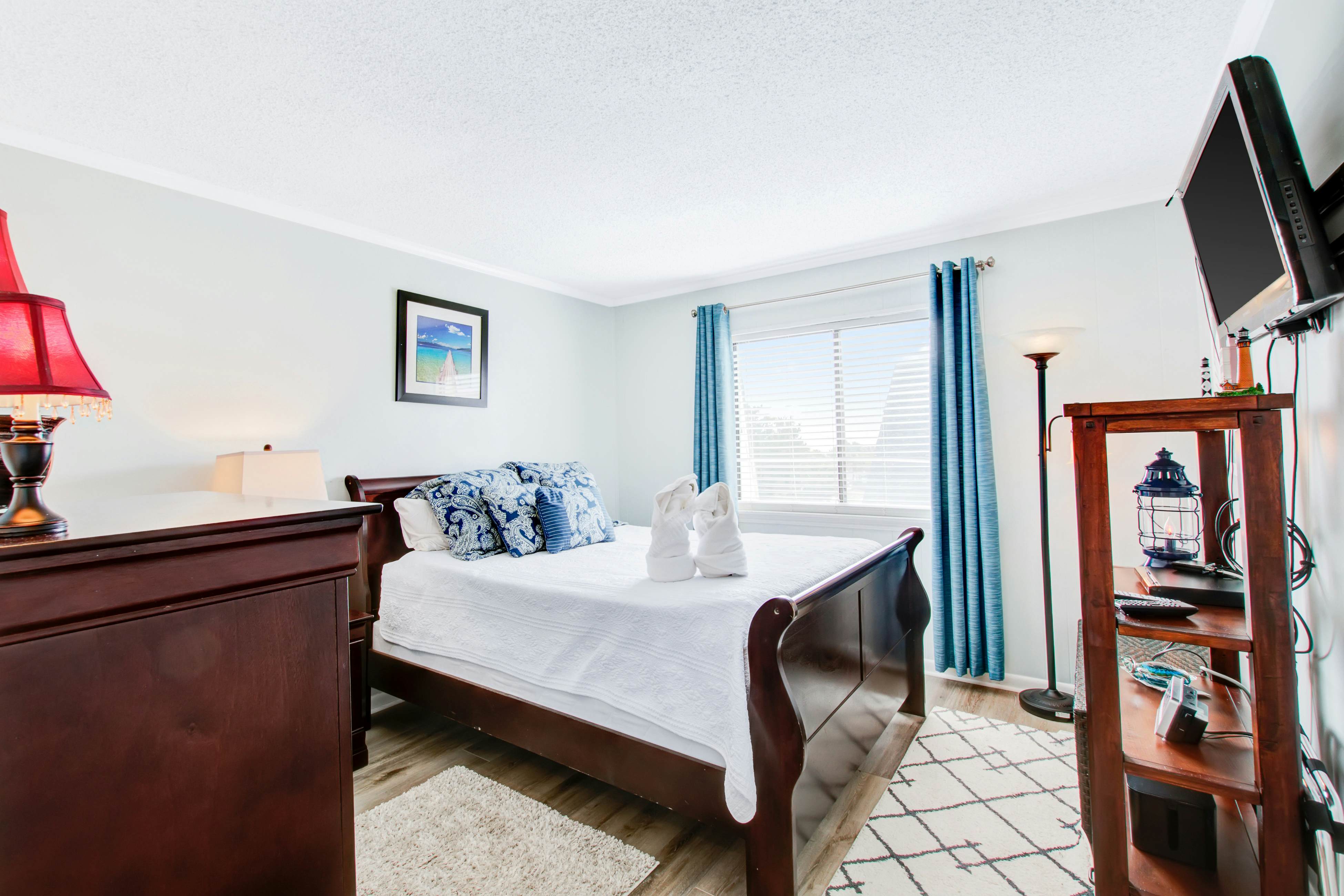 Comfortable villa one row away from the beach w/shared pool & grills