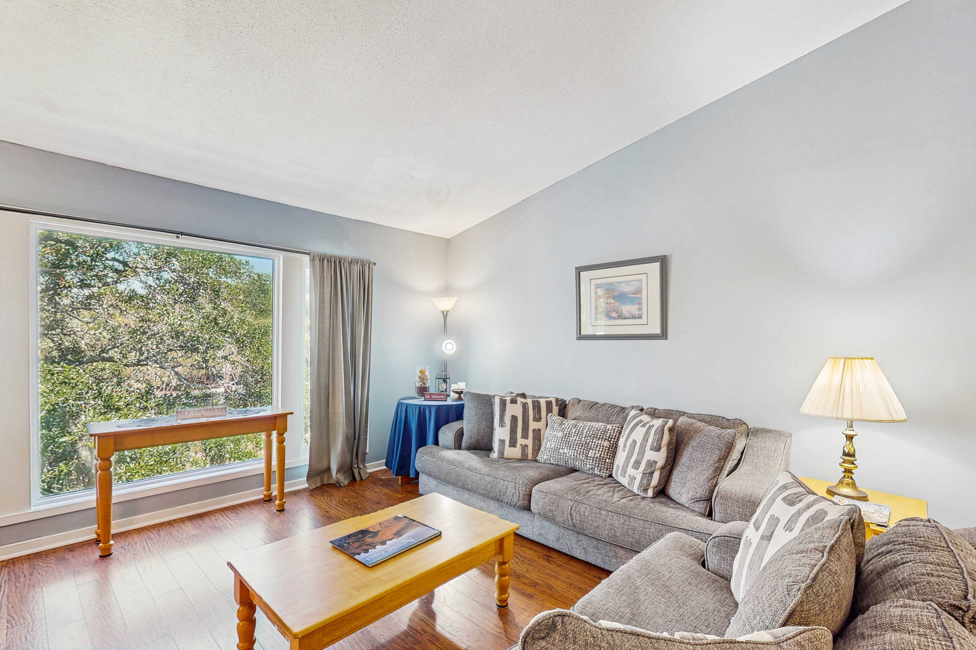 Quaint top floor lagoon view condo w/ community pool access - walk to the beach