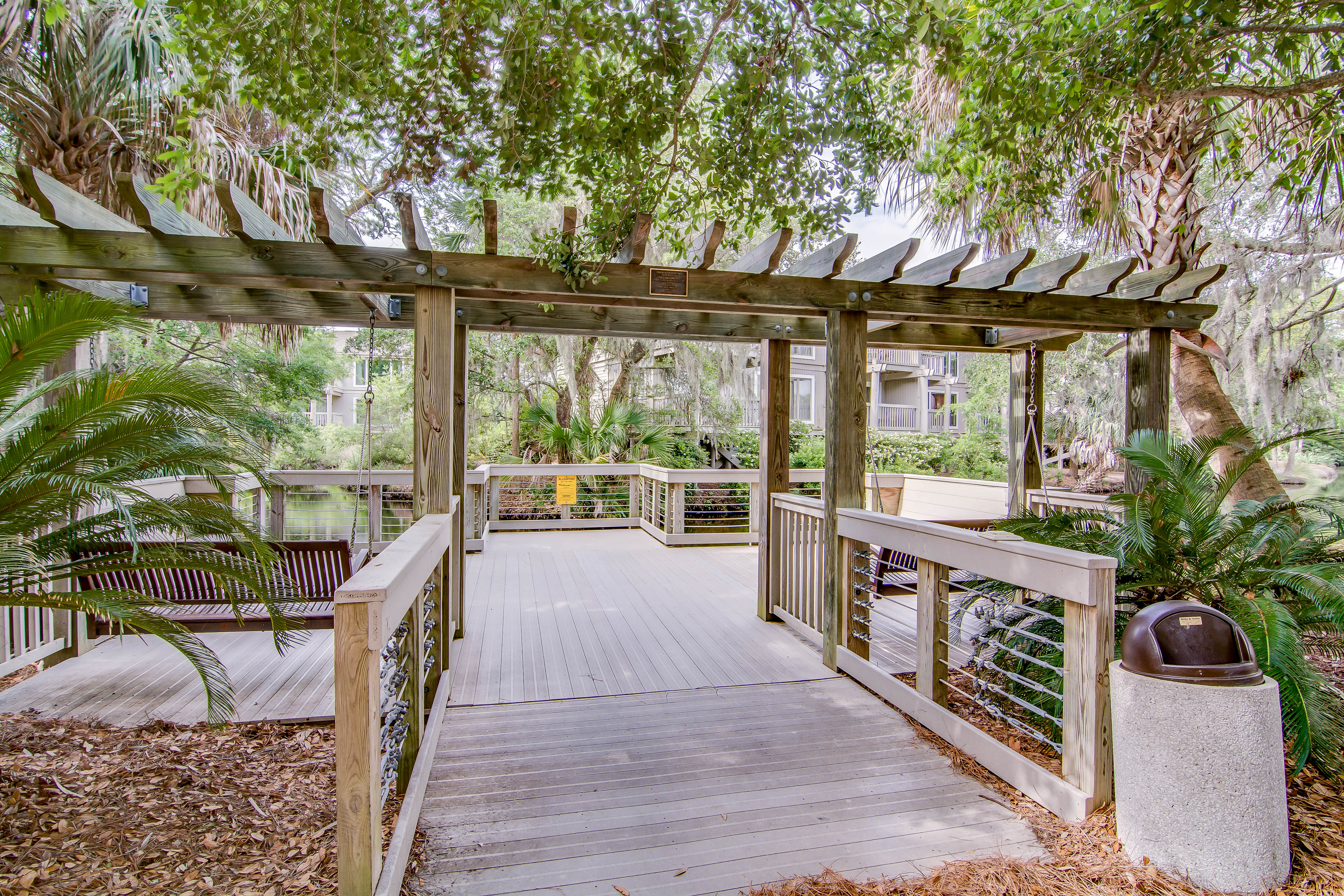 Quaint top floor lagoon view condo w/ community pool access - walk to the beach