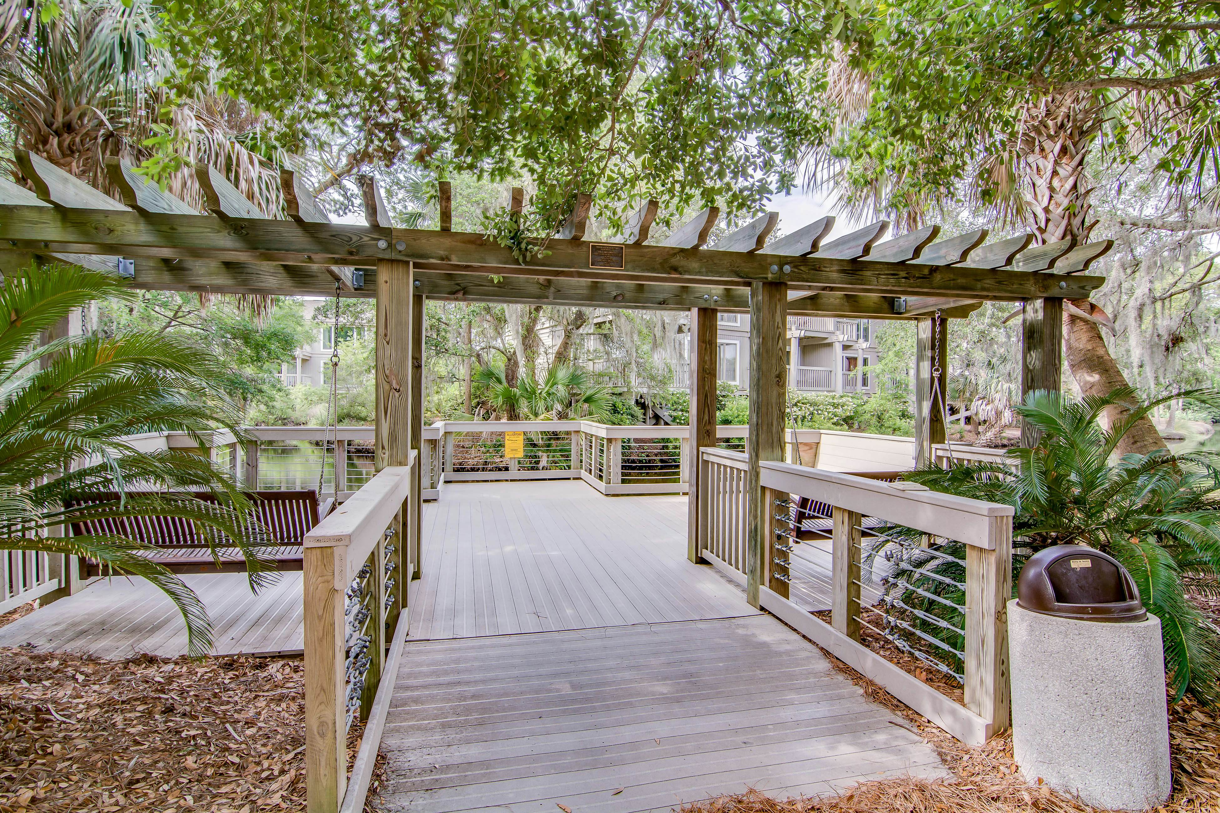Quaint top floor lagoon view condo w/ community pool access - walk to the beach
