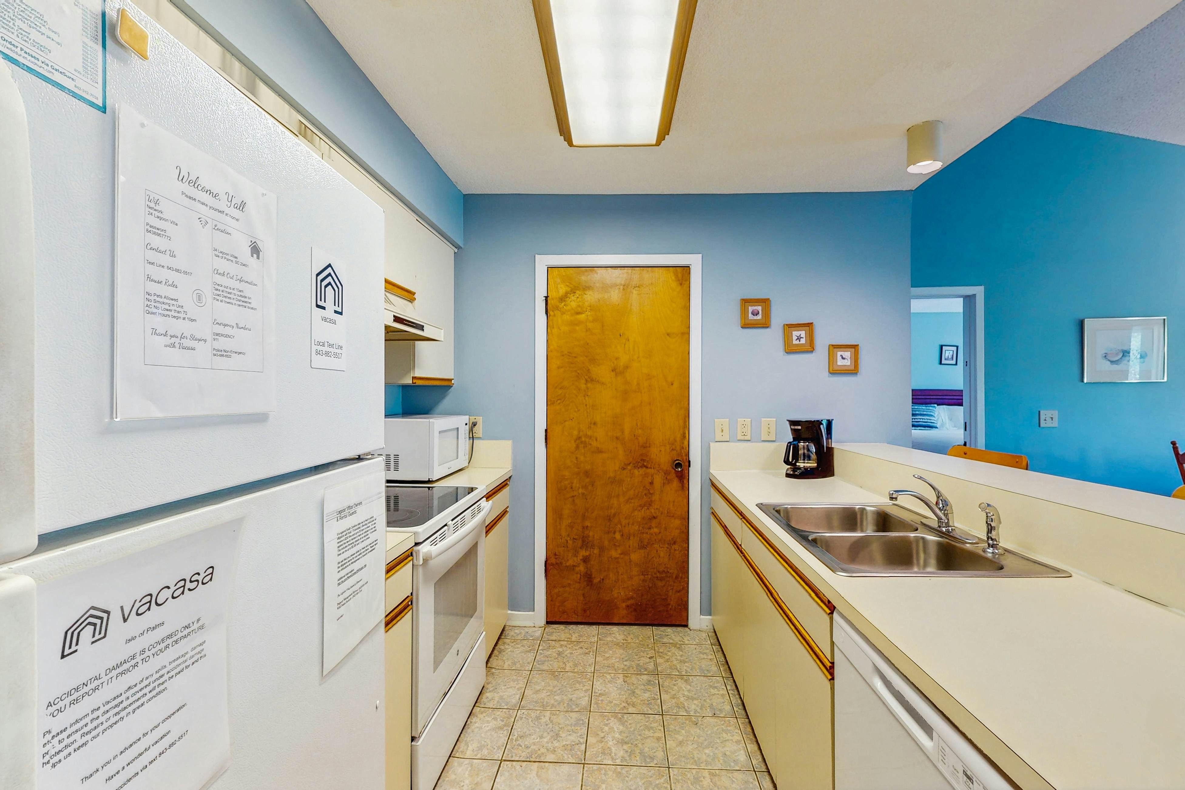 Quaint top floor lagoon view condo w/ community pool access - walk to the beach