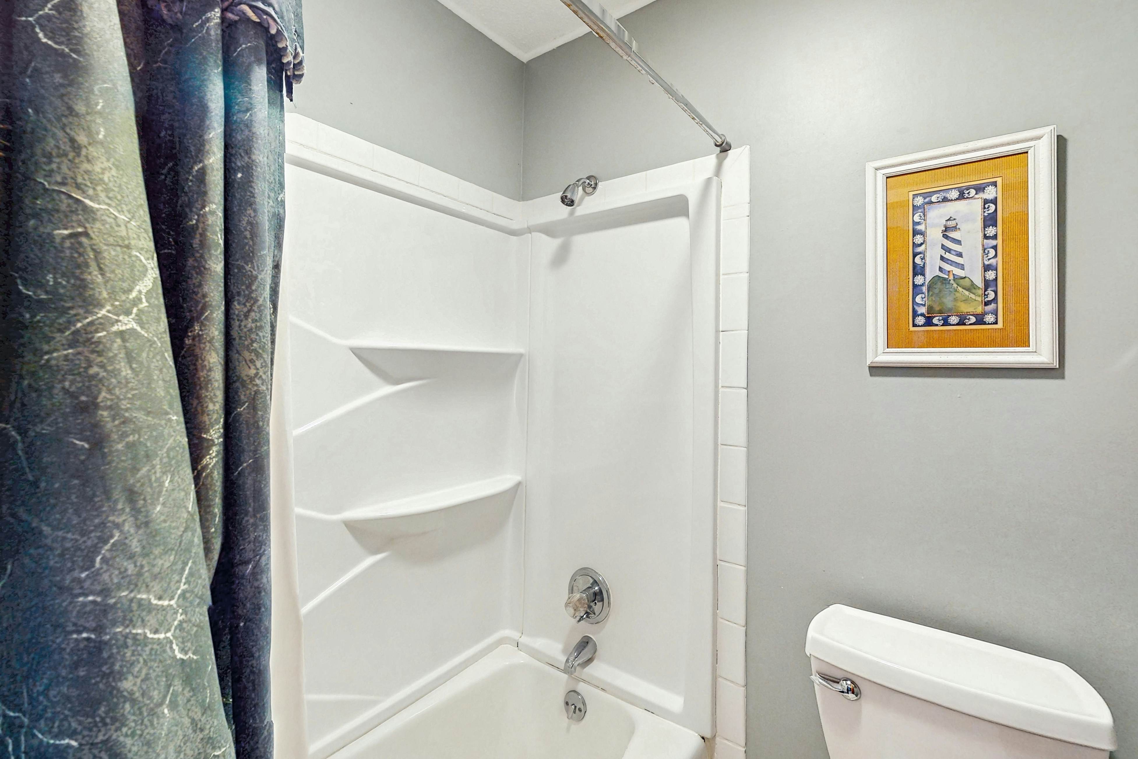 Quaint top floor lagoon view condo w/ community pool access - walk to the beach