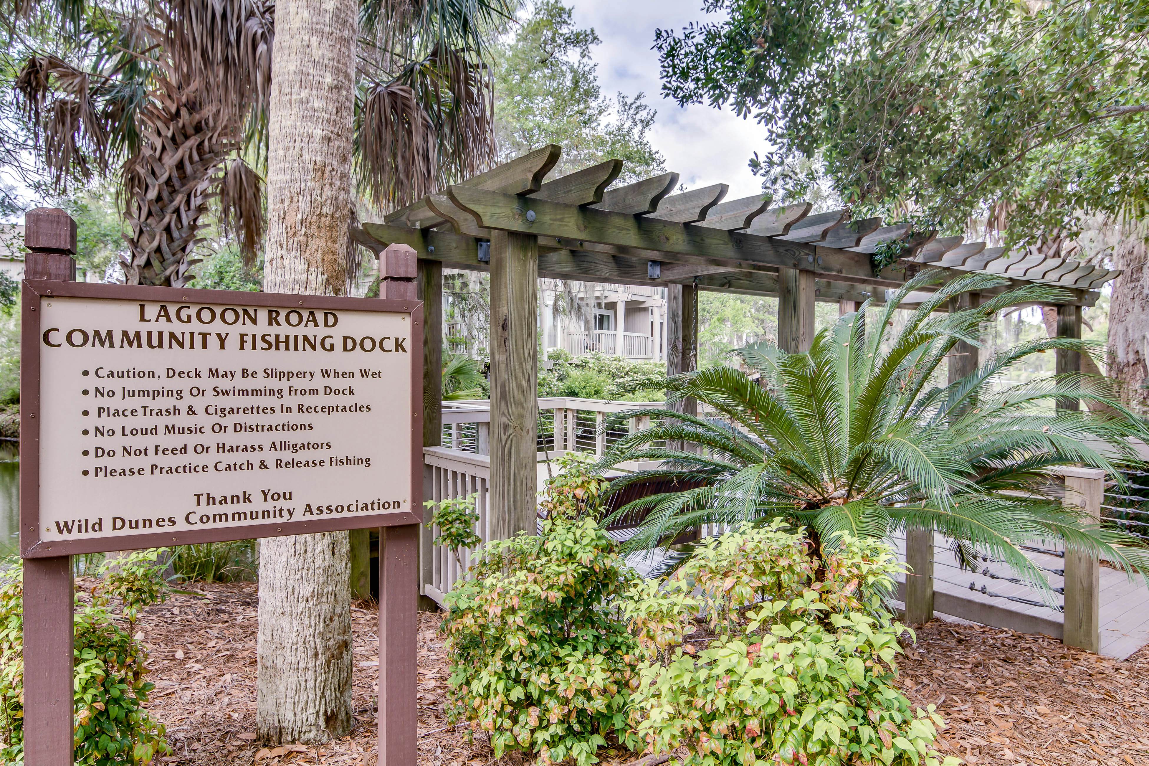 Quaint top floor lagoon view condo w/ community pool access - walk to the beach