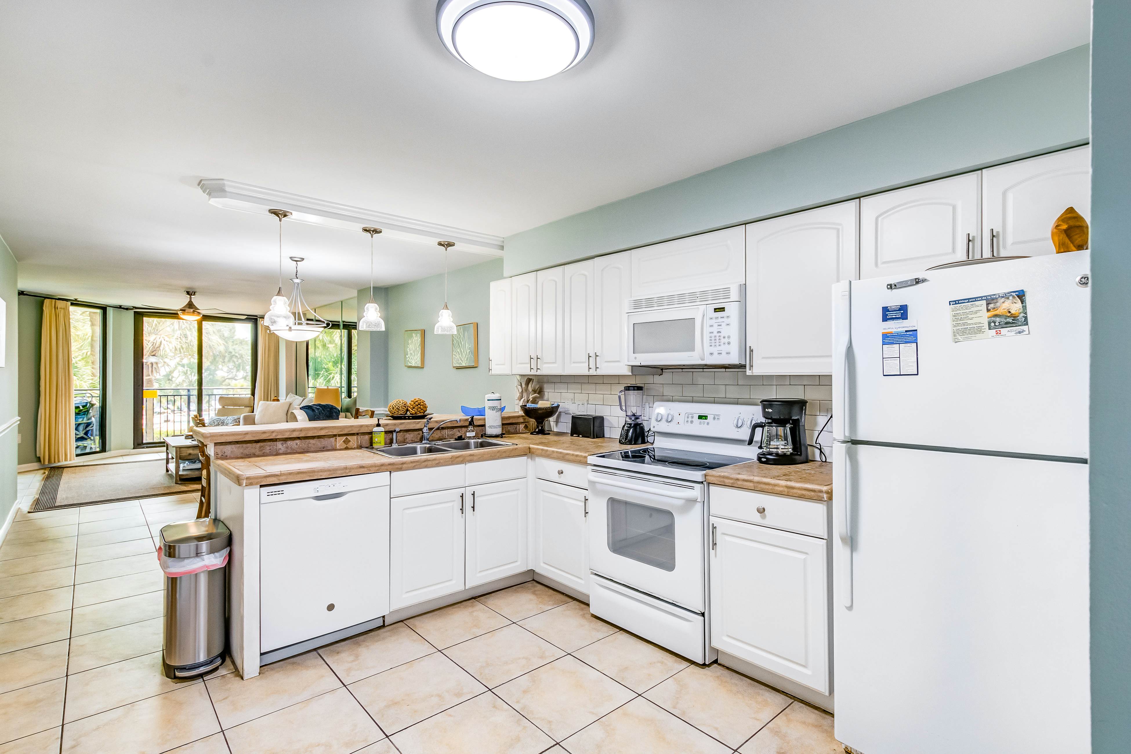 Beachfront villa w/ access to shared pool, beach, or golf, & w/shared gas grill