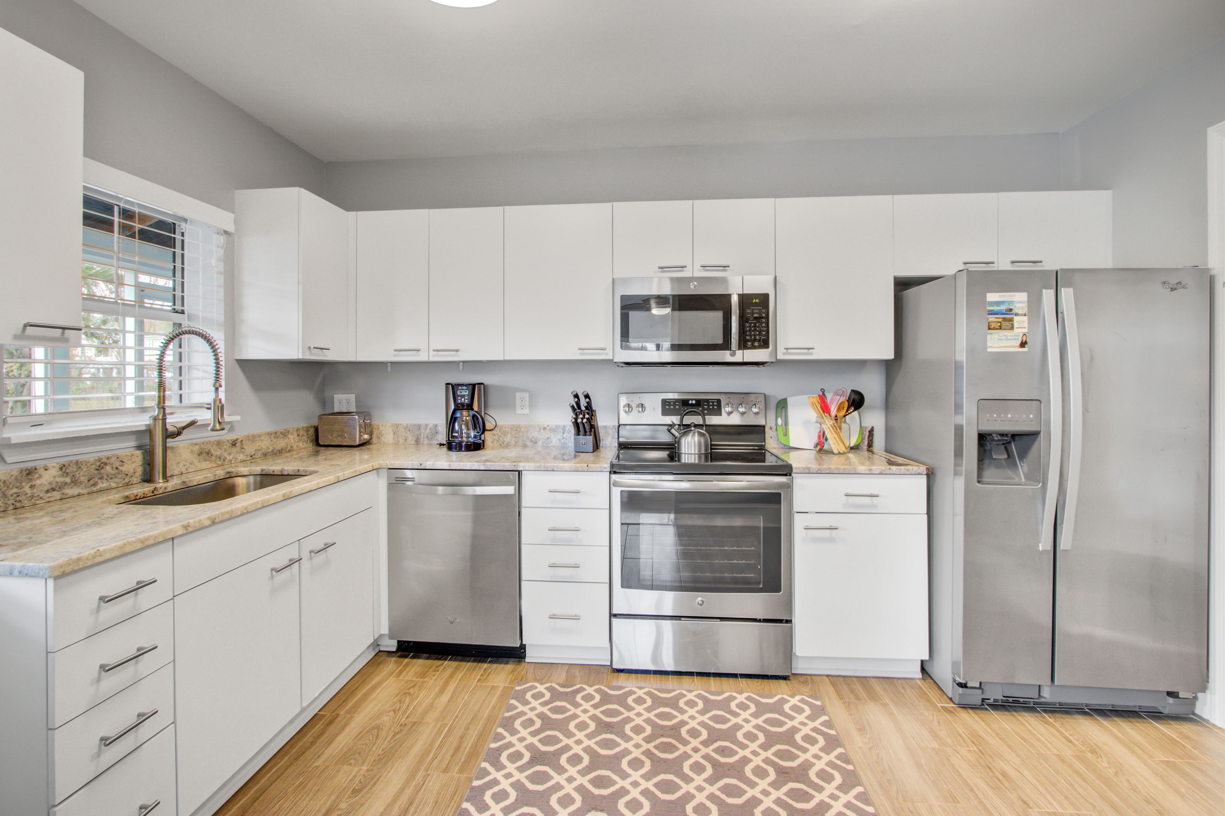 Dog-friendly, ocean-view getaway with grill, deck, beach access & basketball