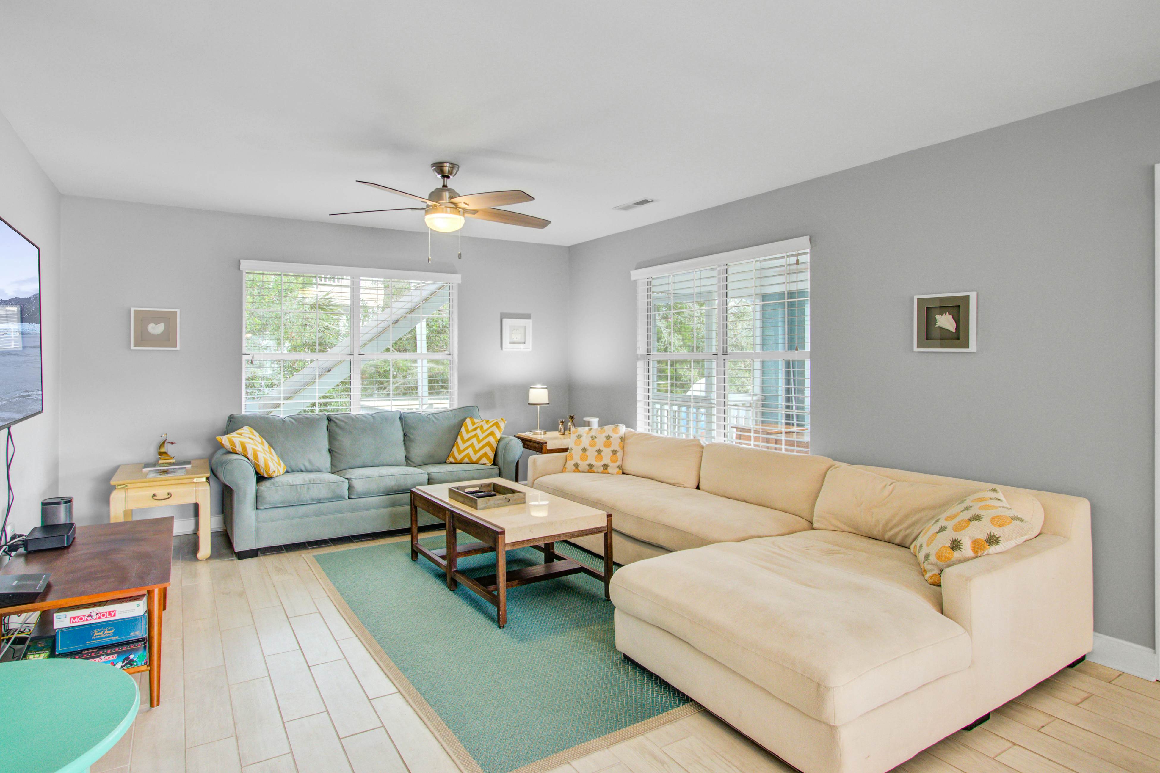 Convenient dog-friendly retreat steps from the beach with grill & screened porch