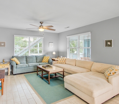 Convenient dog-friendly retreat steps from the beach with grill & screened porch