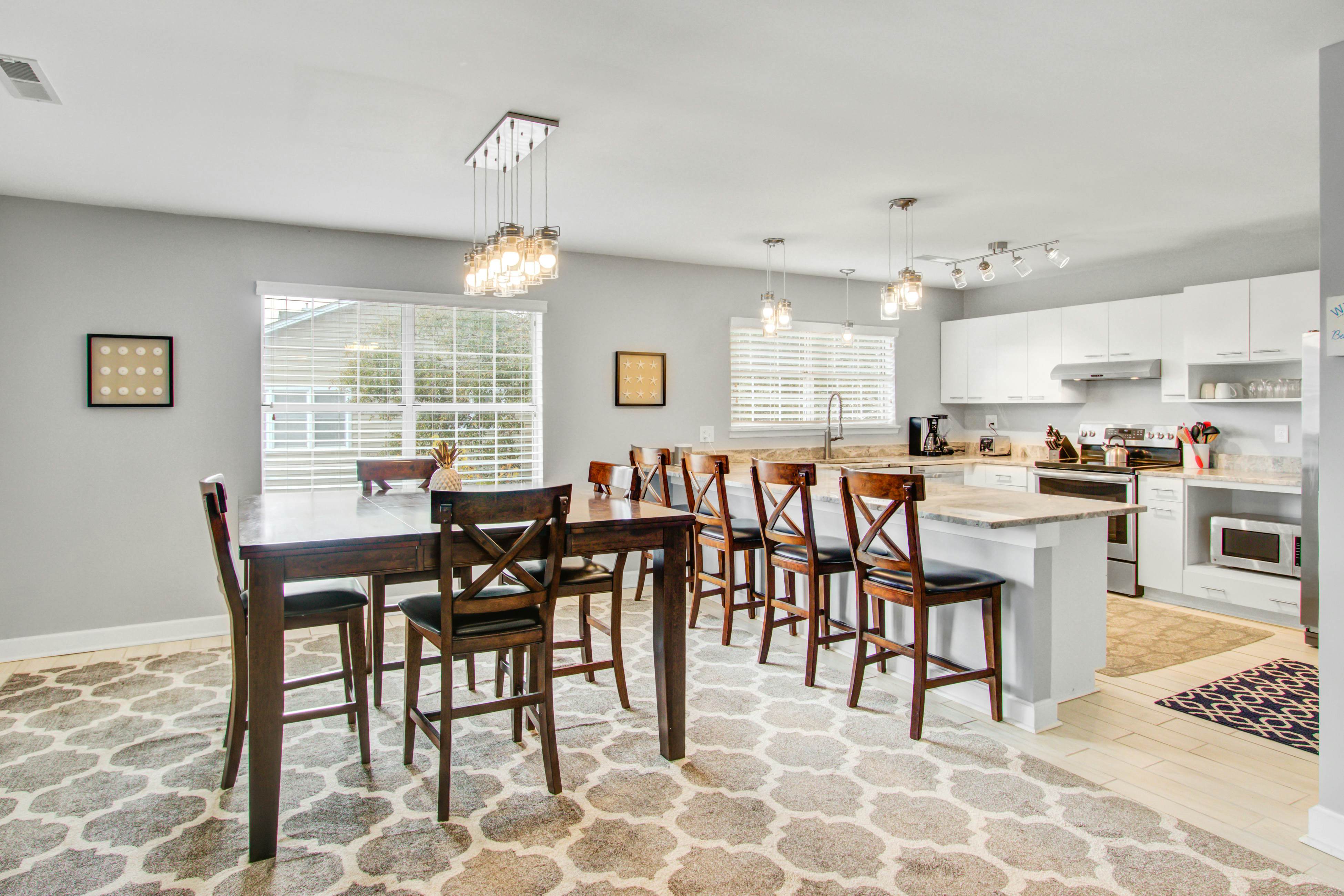 Convenient dog-friendly retreat steps from the beach with grill & screened porch
