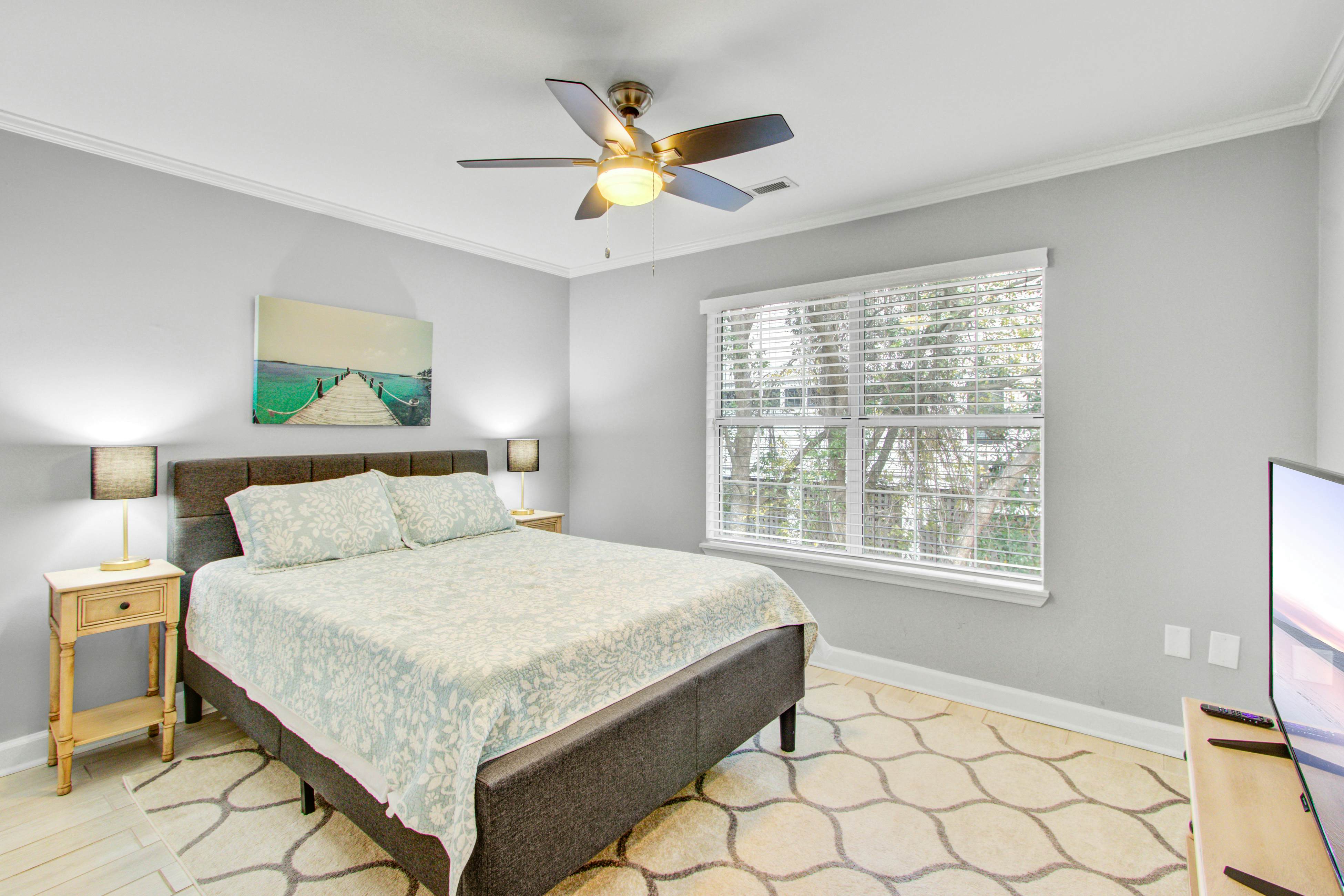 Convenient dog-friendly retreat steps from the beach with grill & screened porch