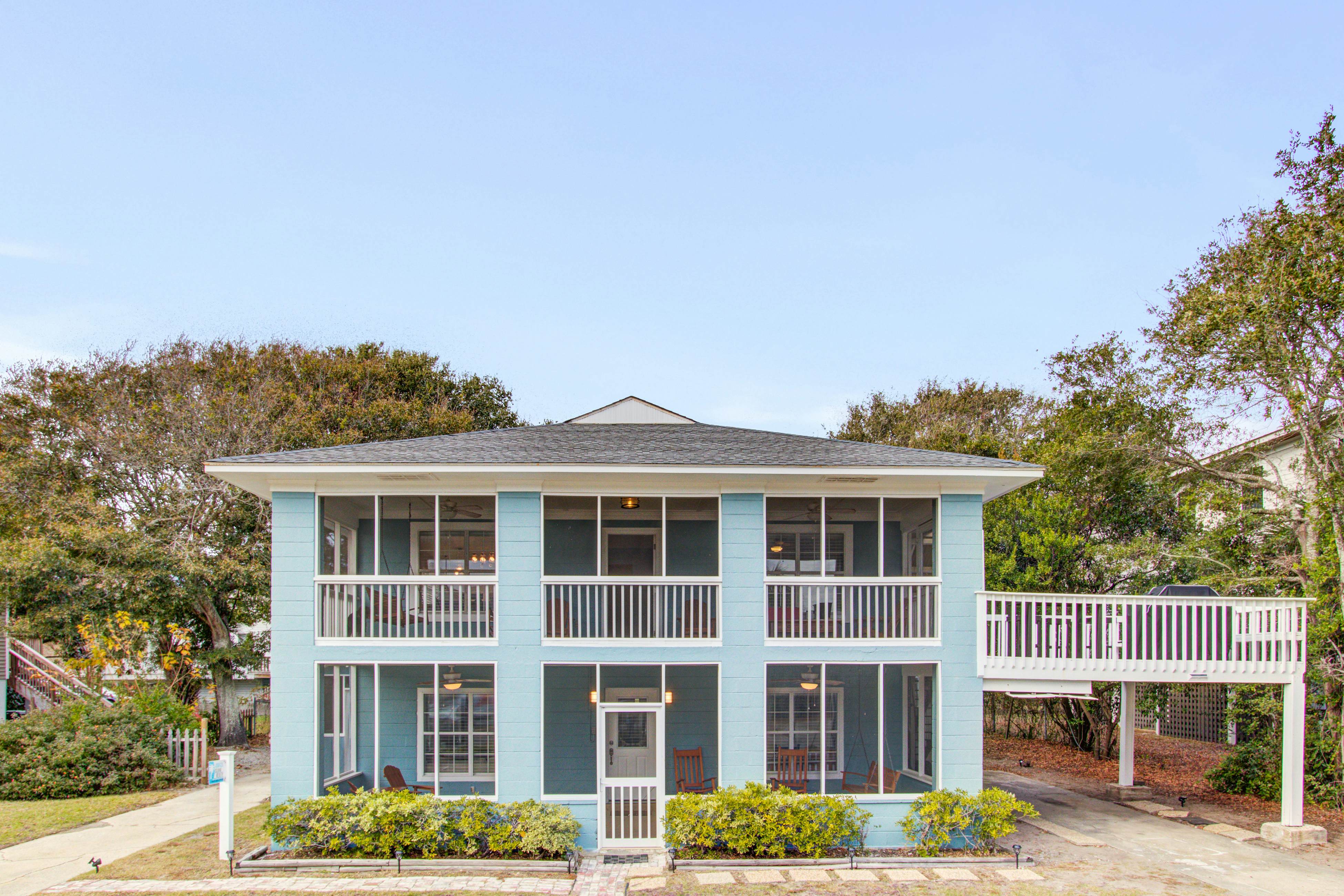 Convenient dog-friendly retreat steps from the beach with grill & screened porch