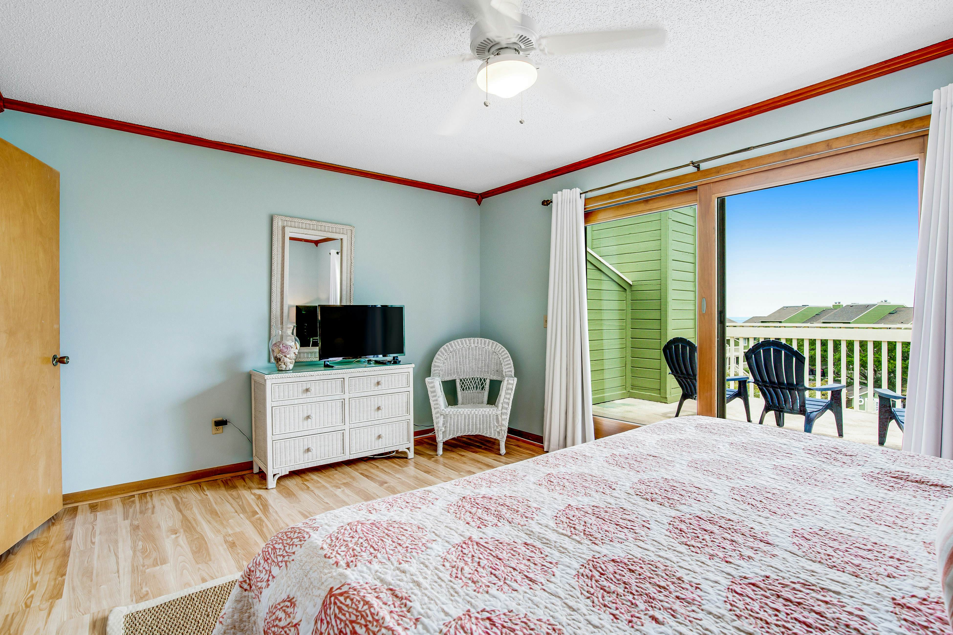 Three-story ocean-view villa with pool, balcony, charcoal grill, & central AC