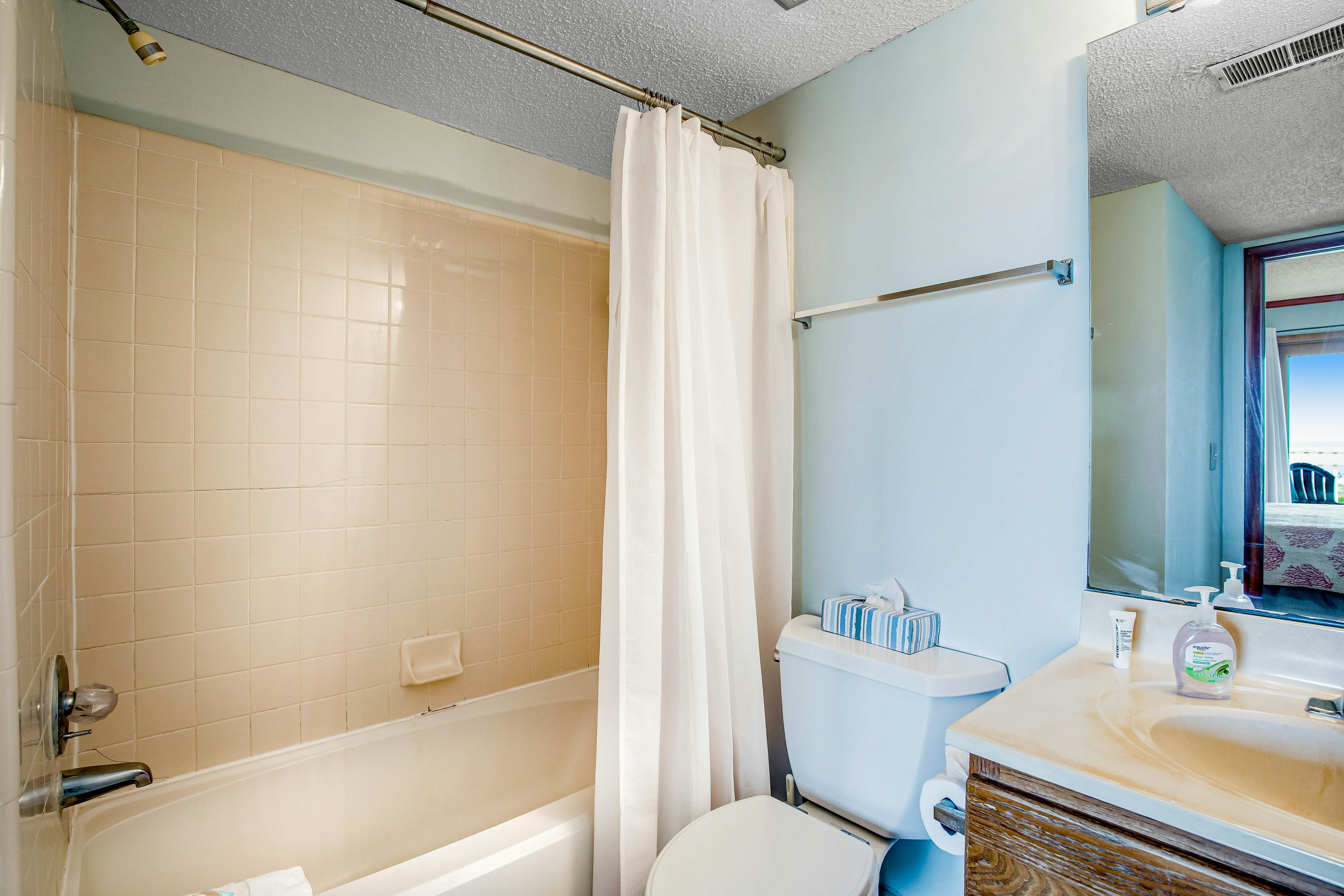 Three-story ocean-view villa with pool, balcony, charcoal grill, & central AC