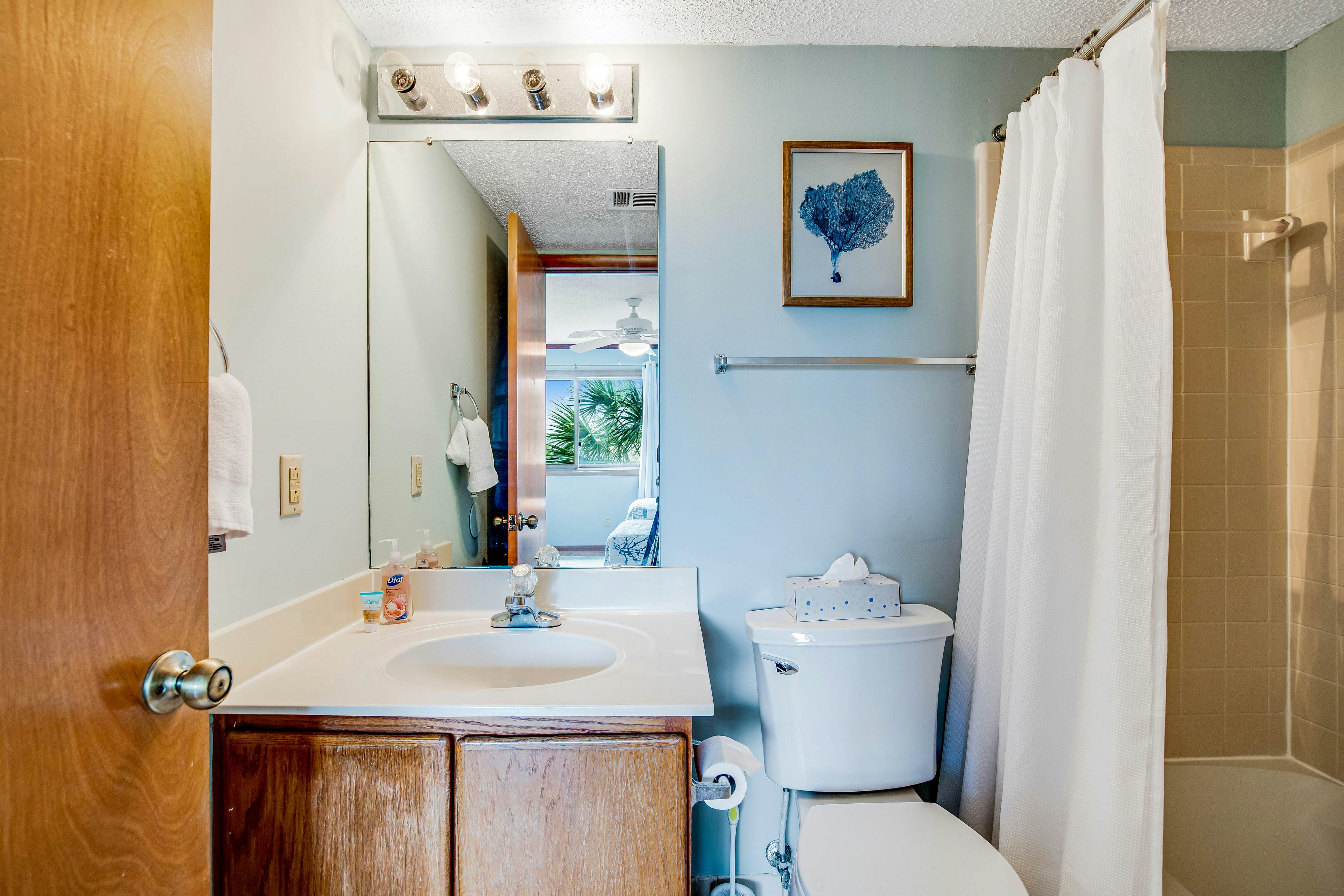 Three-story ocean-view villa with pool, balcony, charcoal grill, & central AC