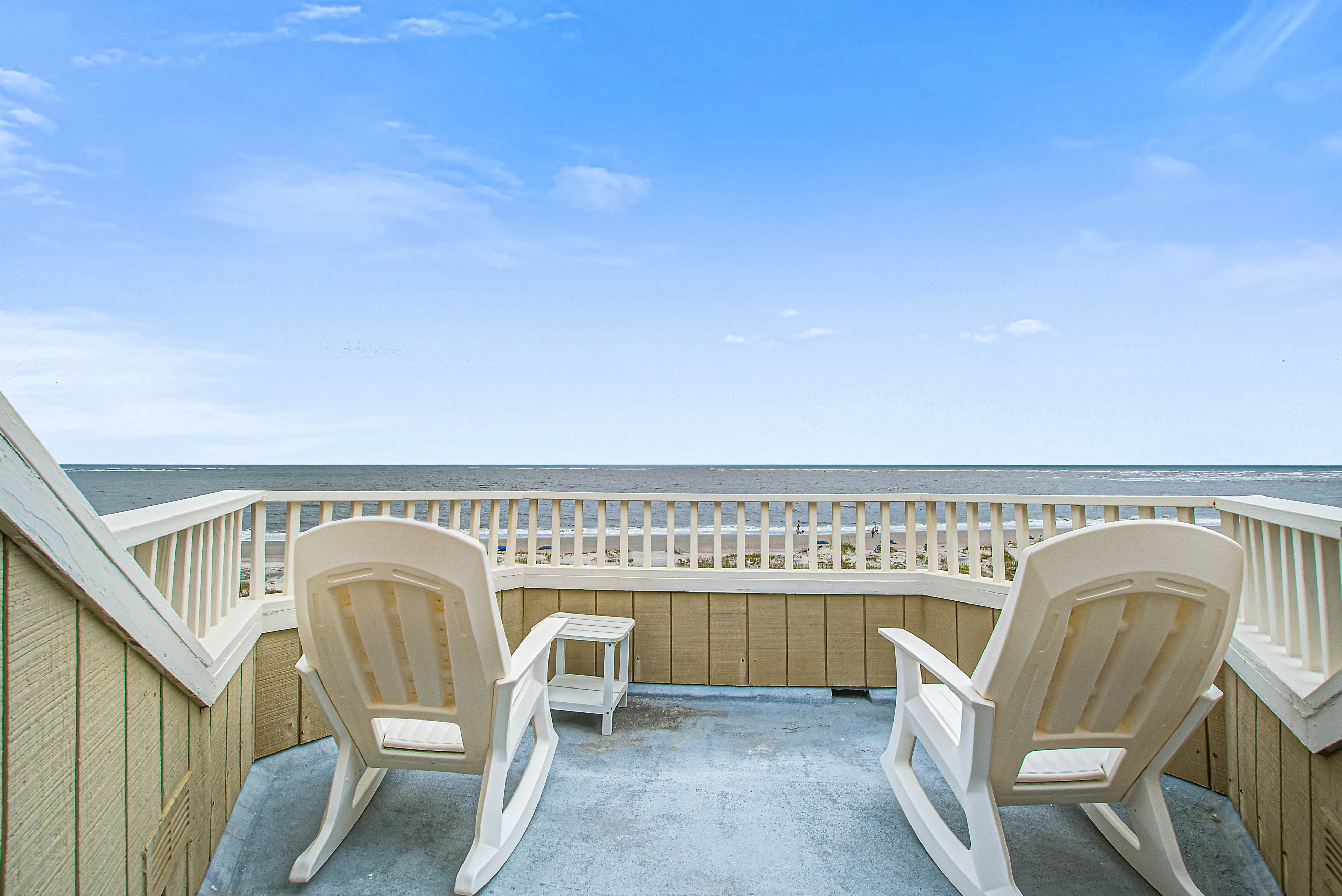 Top floor oceanfront condo w/ocean and beach views from every room & shared pool