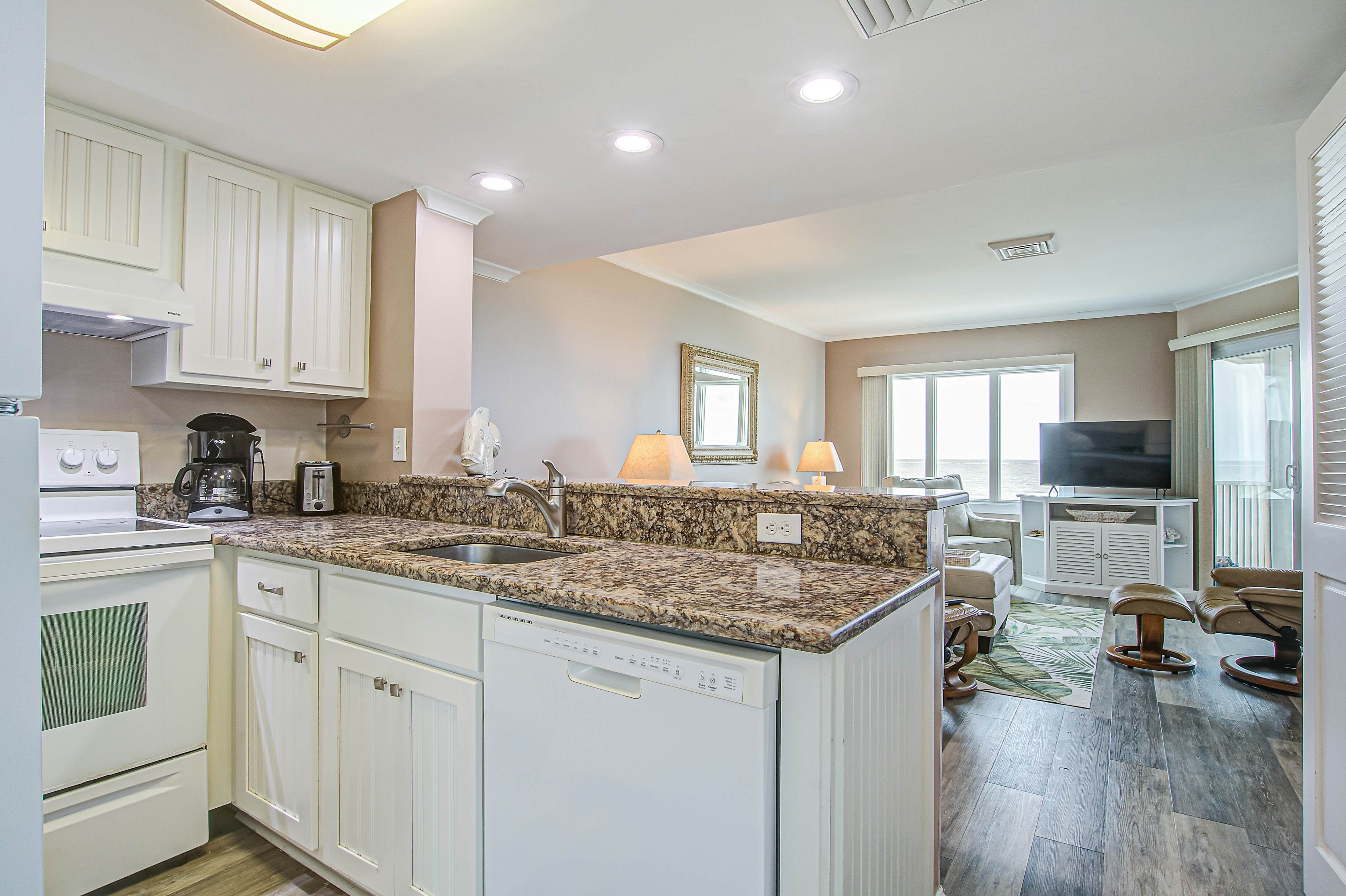 Top floor oceanfront condo w/ocean and beach views from every room & shared pool