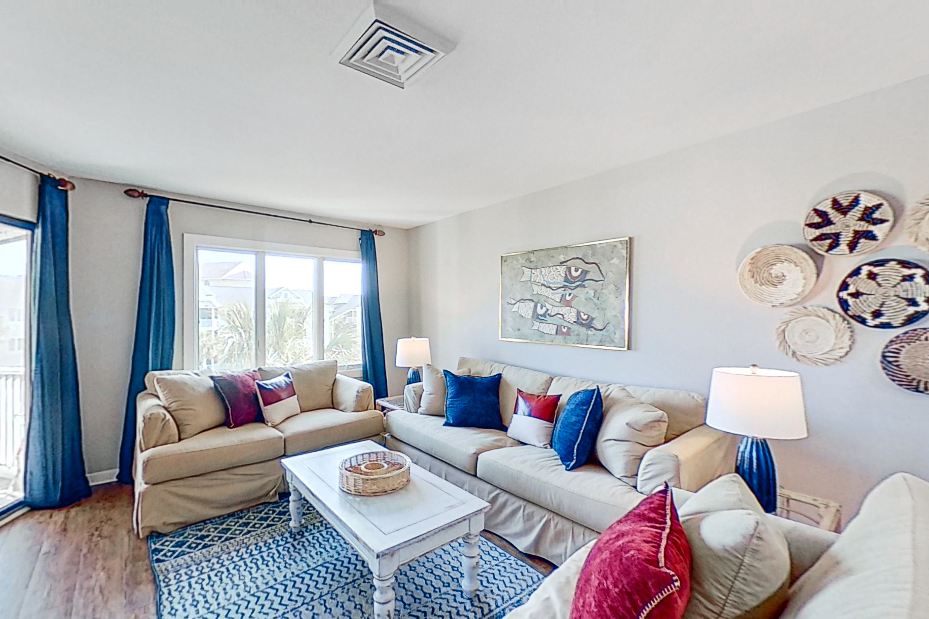 Lovely top floor villa in Wild Dunes with partial ocean views, pool, & W/D