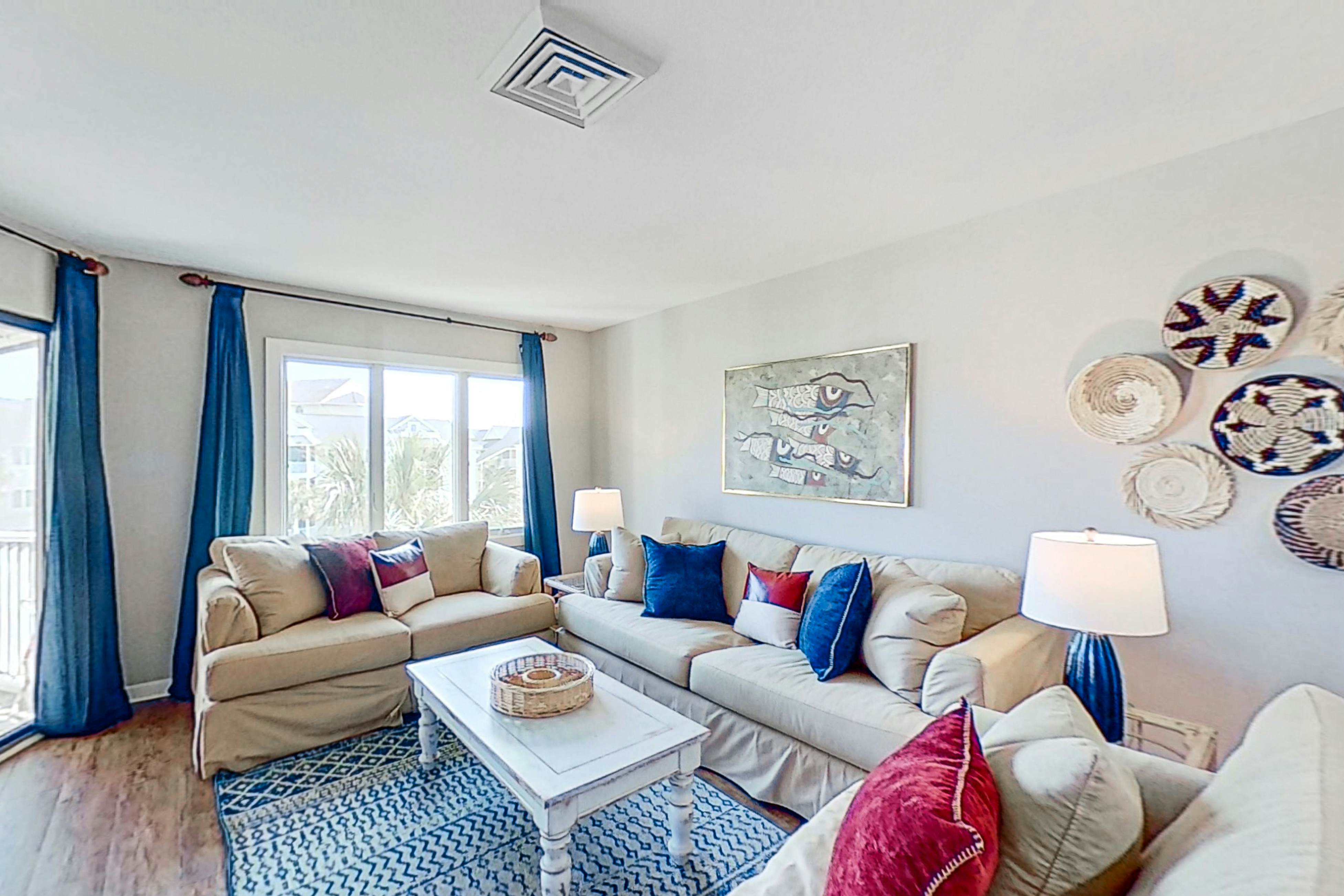 Lovely top floor villa in Wild Dunes with partial ocean views, pool, & W/D