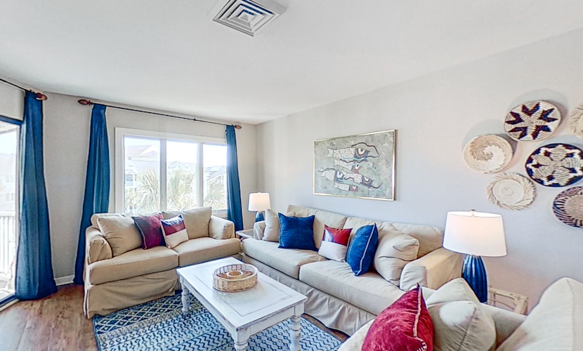 Lovely top floor villa in Wild Dunes with partial ocean views, pool, & W/D