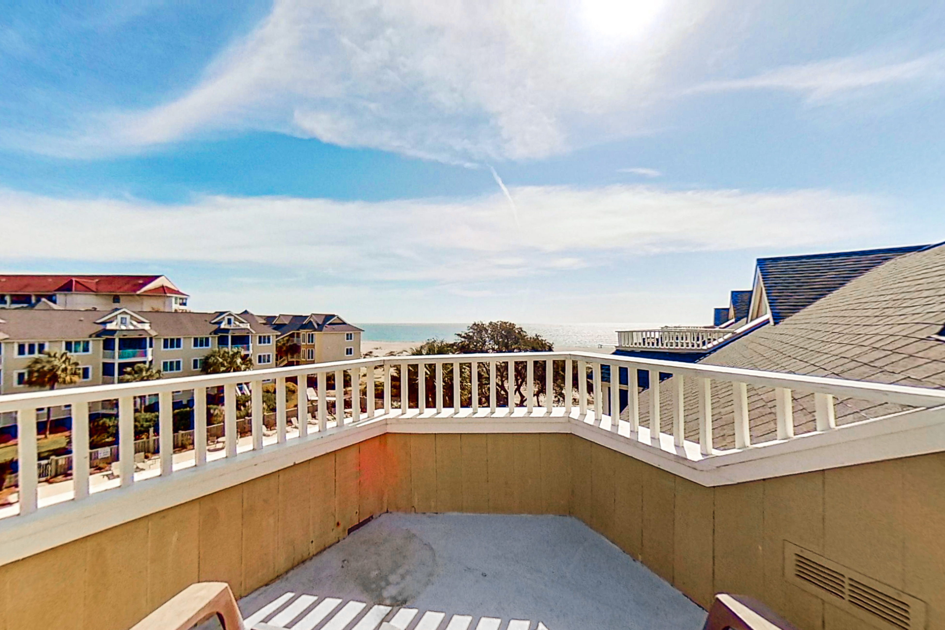 Lovely top floor villa in Wild Dunes with partial ocean views, pool, & W/D