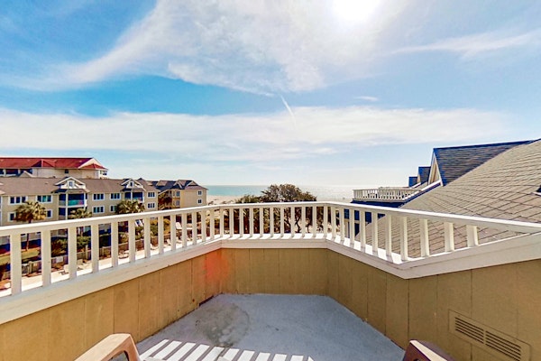 Lovely top floor villa in Wild Dunes with partial ocean views, pool, & W/D