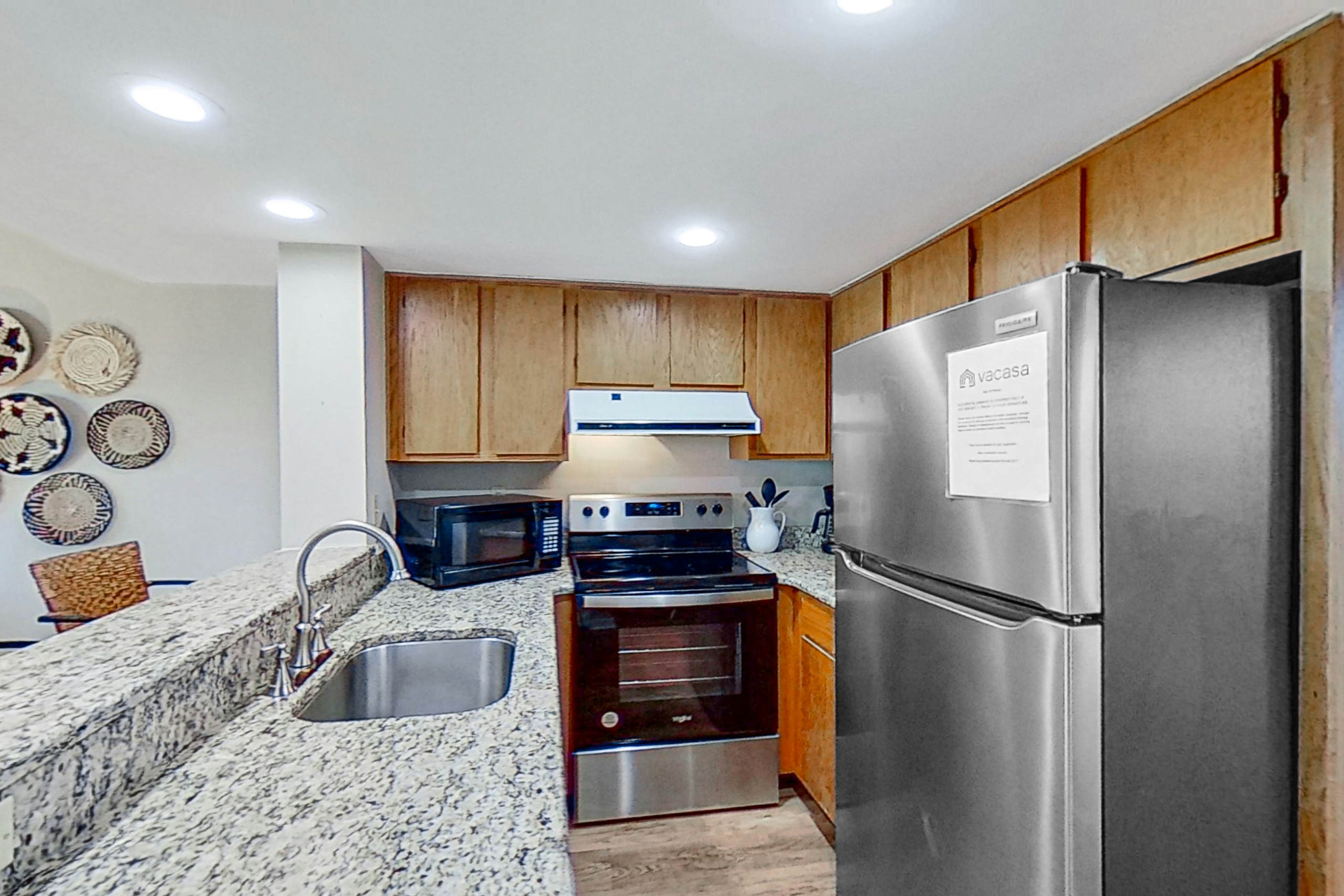 Lovely top floor villa in Wild Dunes with partial ocean views, pool, & W/D