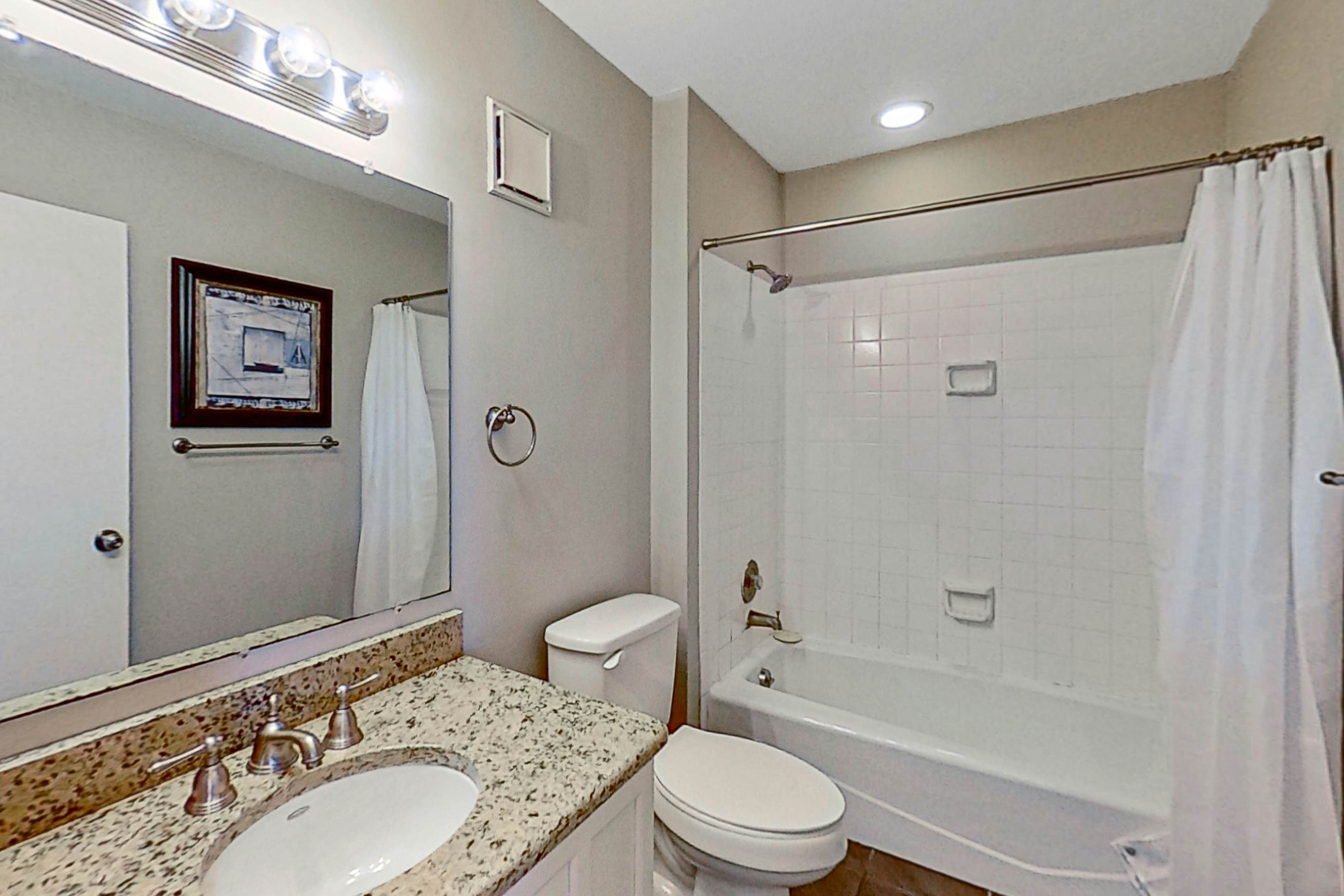 Lovely top floor villa in Wild Dunes with partial ocean views, pool, & W/D