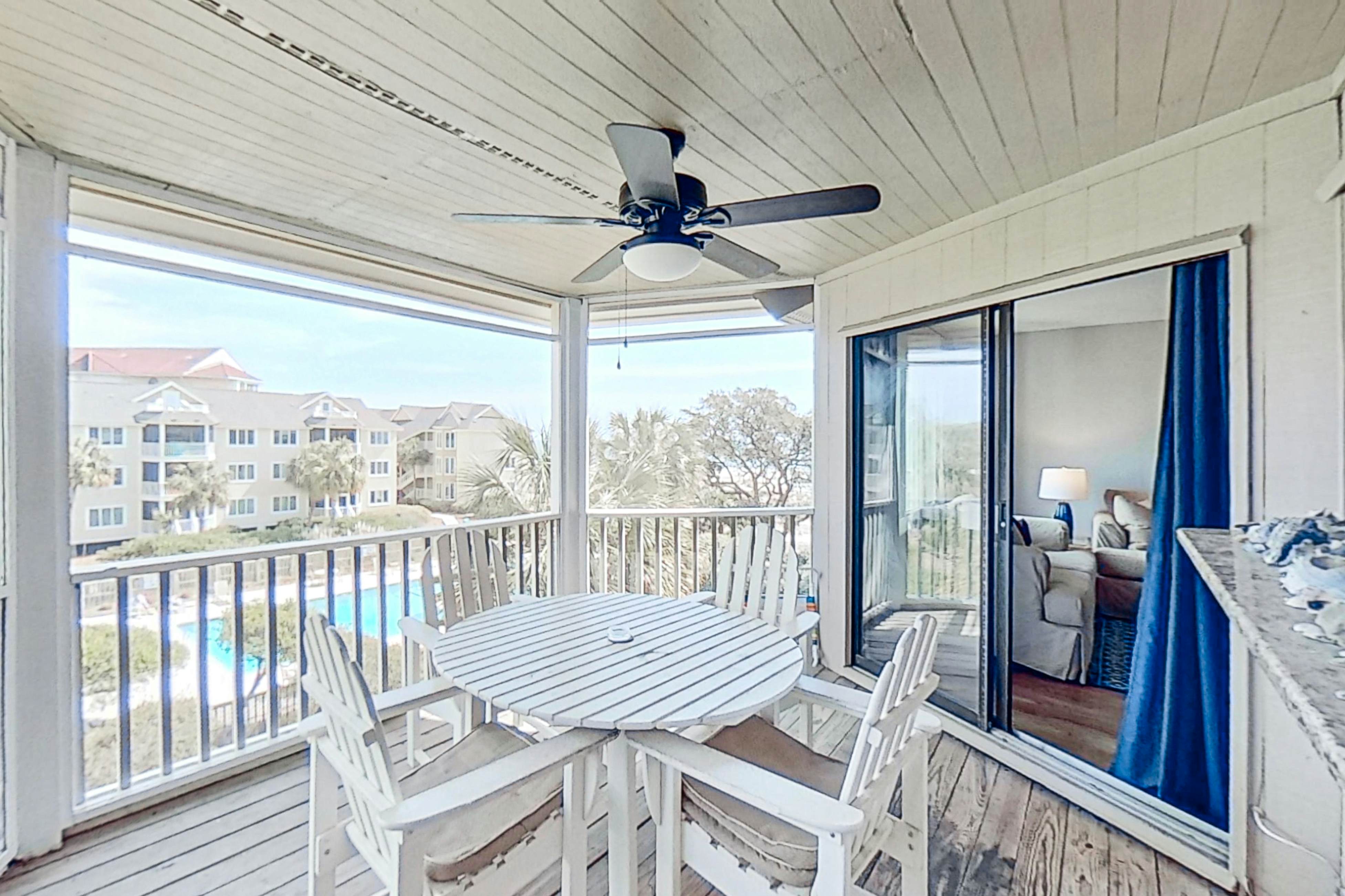 Lovely top floor villa in Wild Dunes with partial ocean views, pool, & W/D