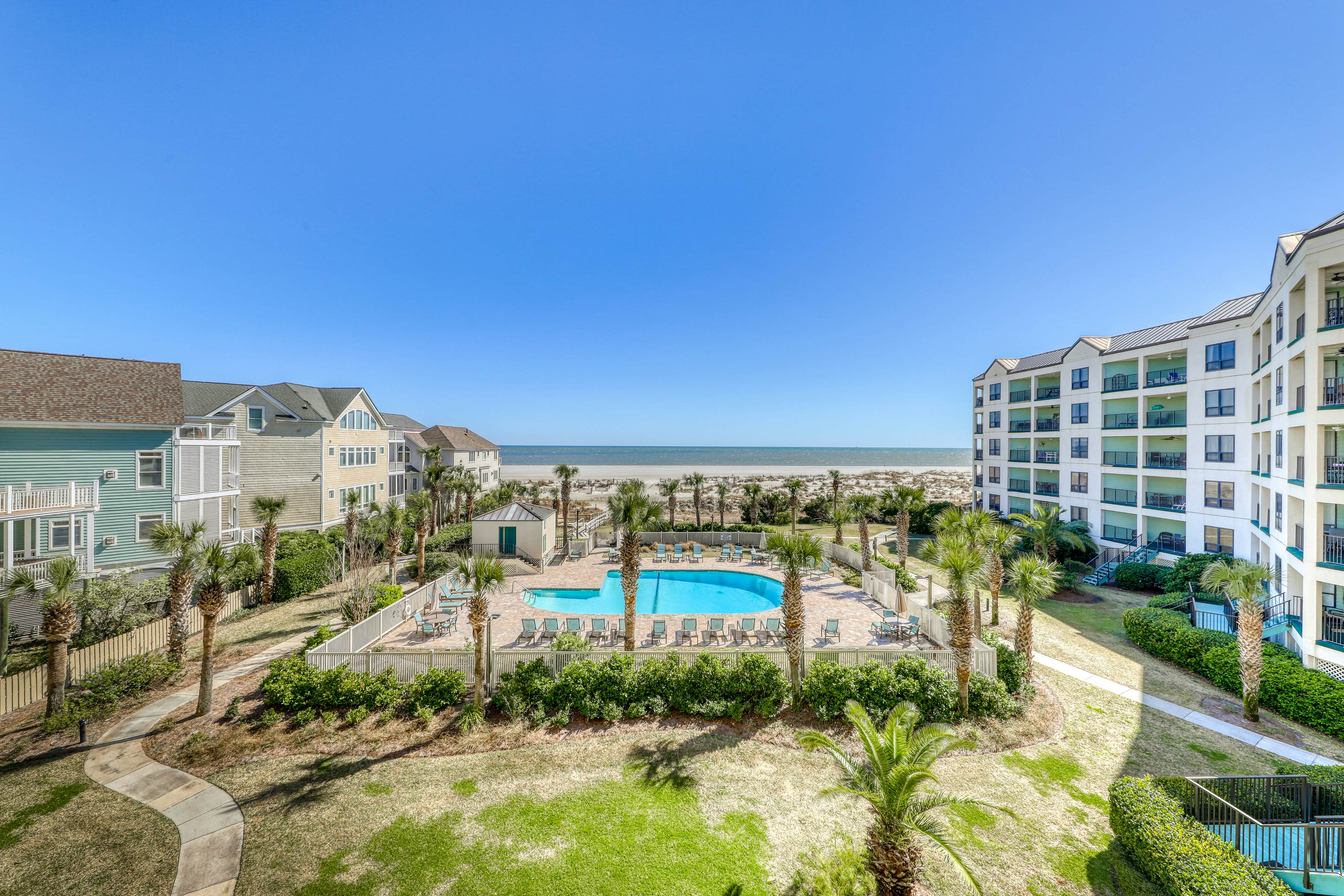 Ocean-view villa at beachfront complex with pool - walk to golf, dining, & more
