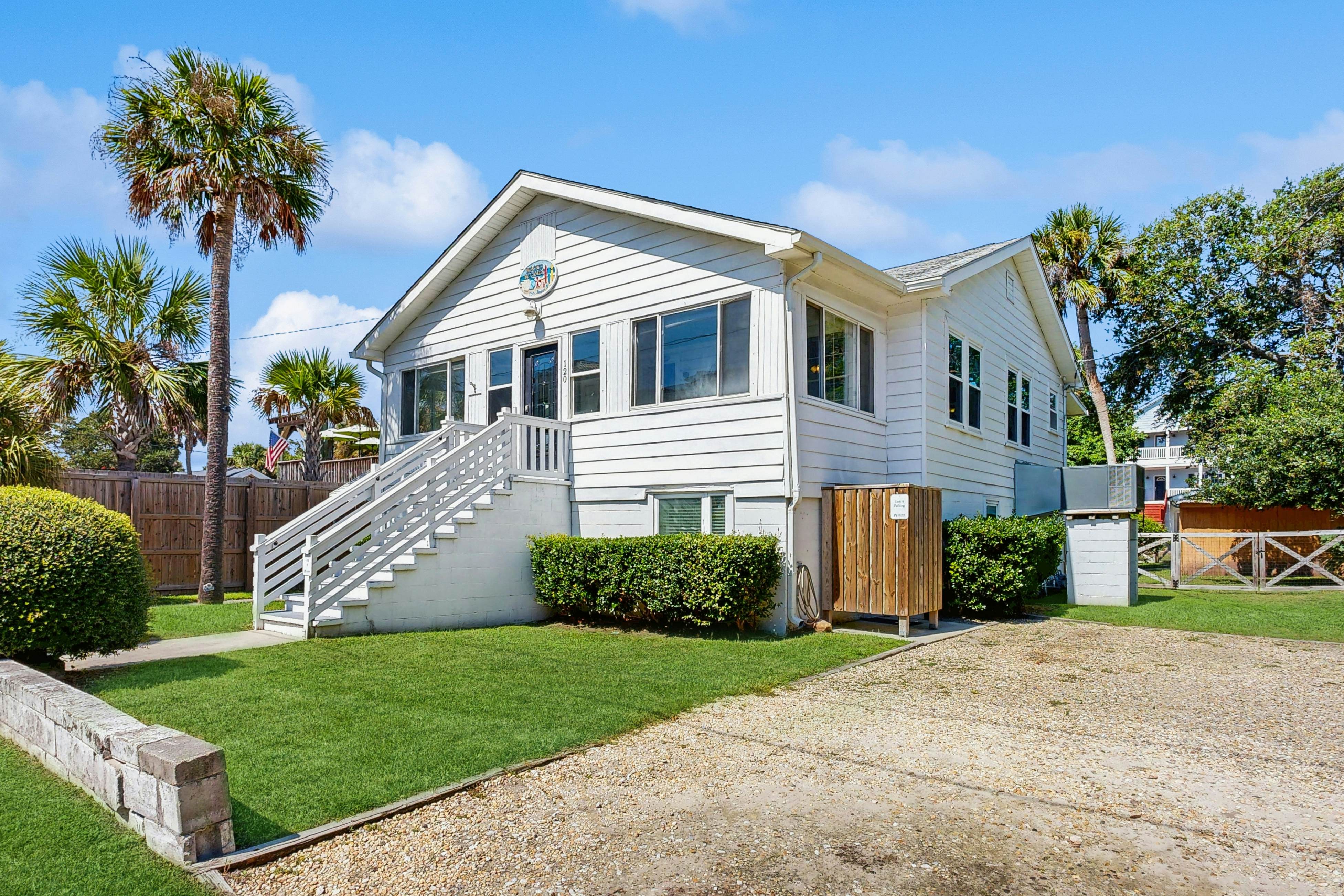 Charming home with enclosed porch, WiFi, & central AC - walk to beach and shops